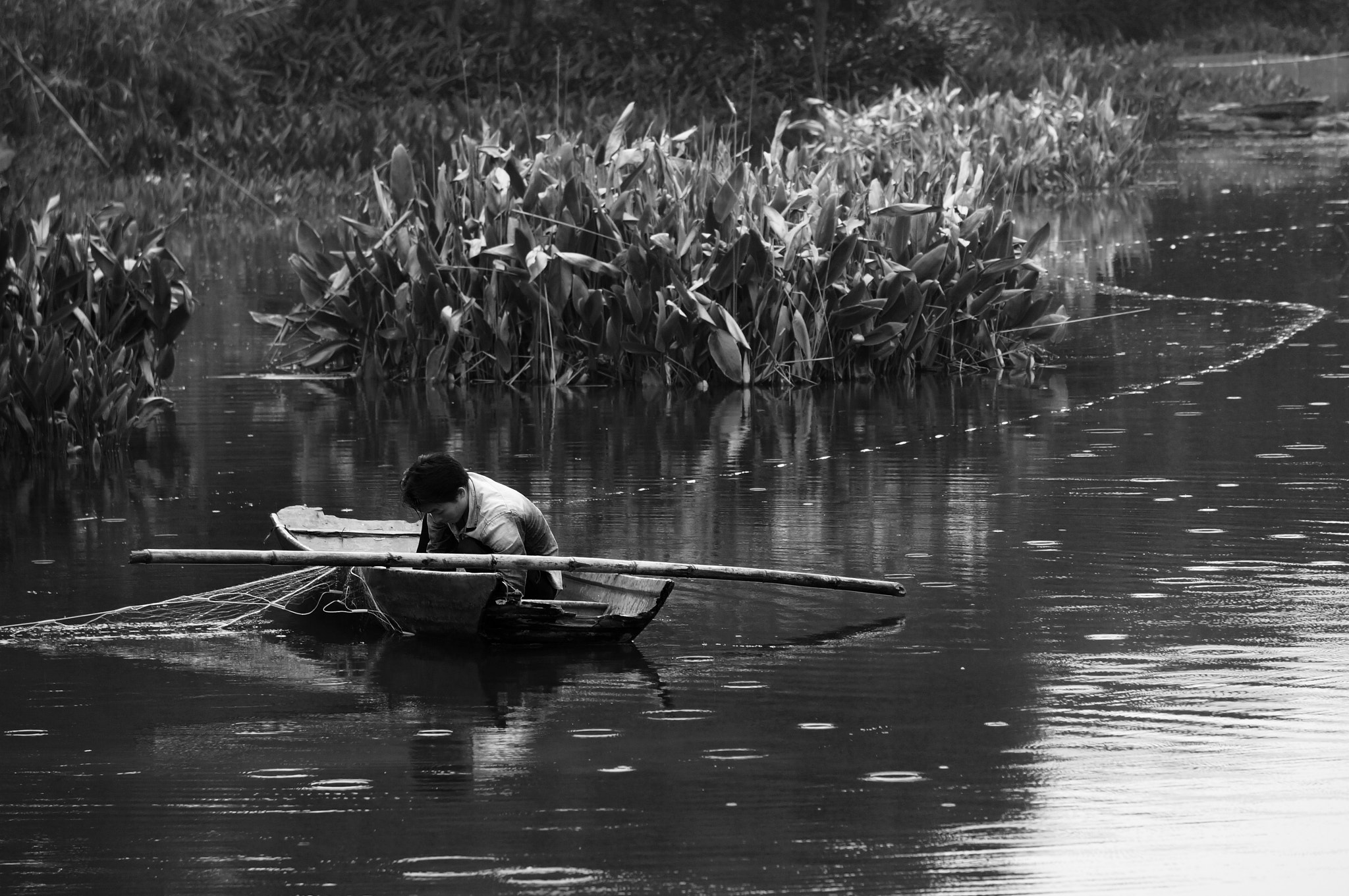 Sony Alpha NEX-3N sample photo. Fishing in the rain photography
