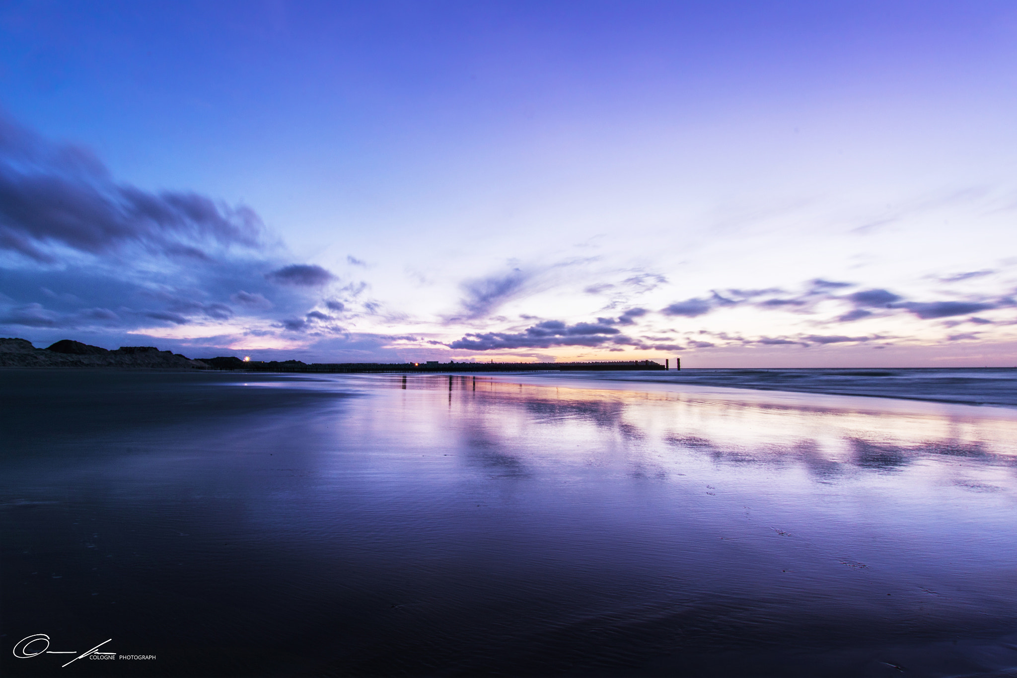 Sony ILCA-77M2 + Sigma 10-20mm F3.5 EX DC HSM sample photo. Colorful sunset in cadzand bad photography