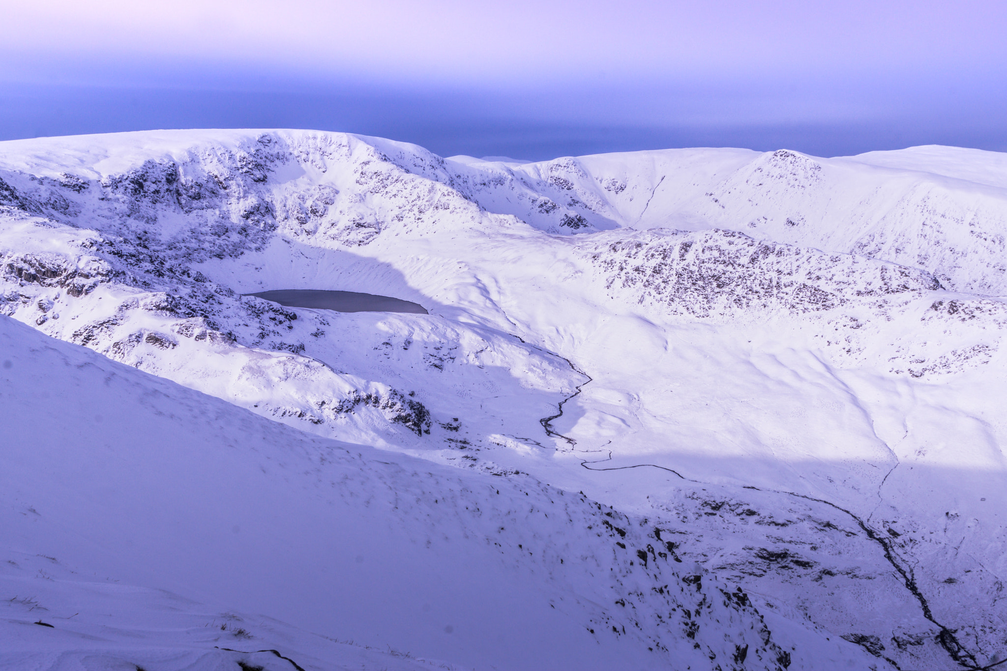 24-70mm F4 ZA OSS sample photo. High mountain tarn photography