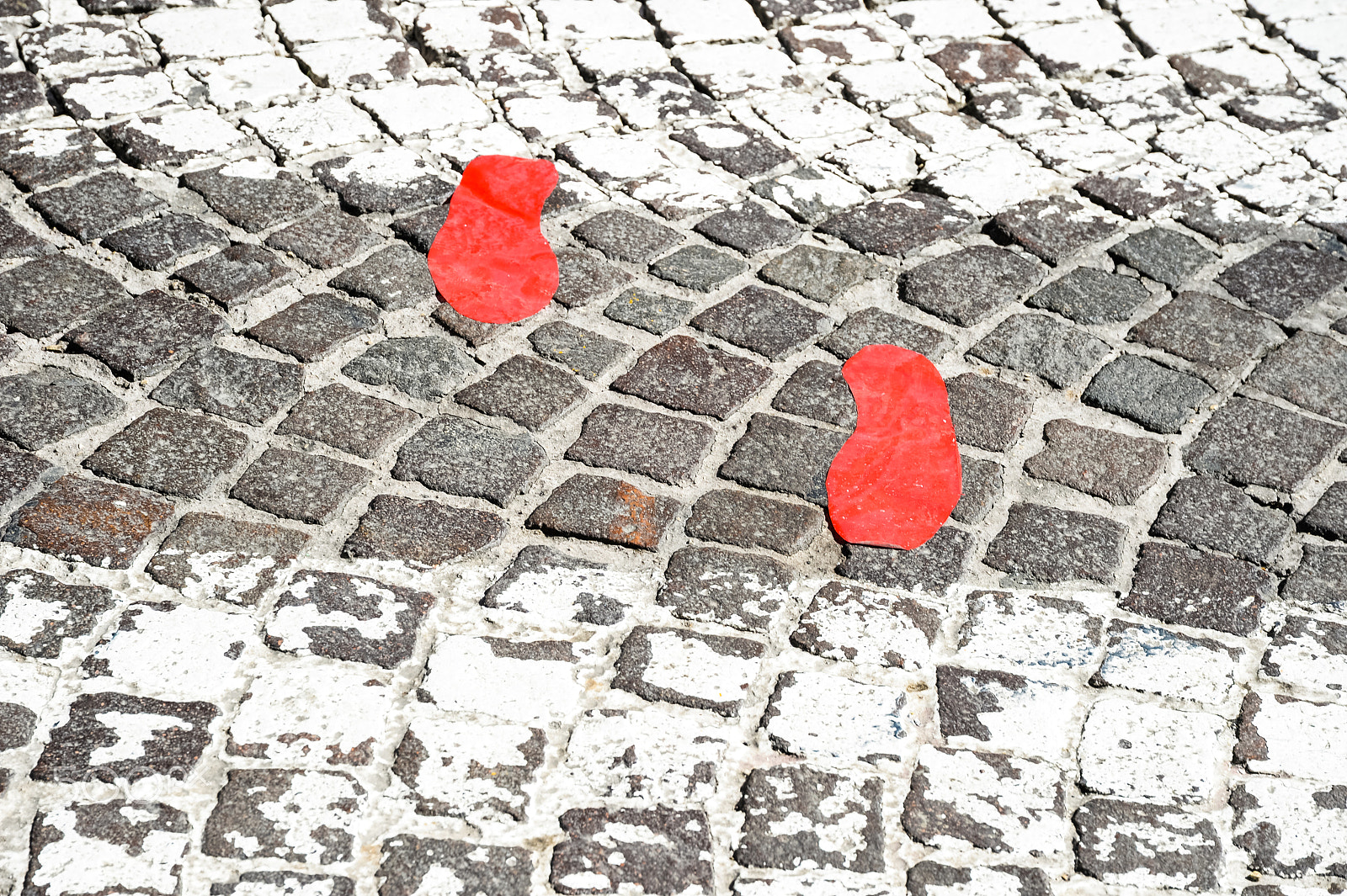 Nikon Df + Sigma 24-105mm F4 DG OS HSM Art sample photo. Red footsteps in town photography