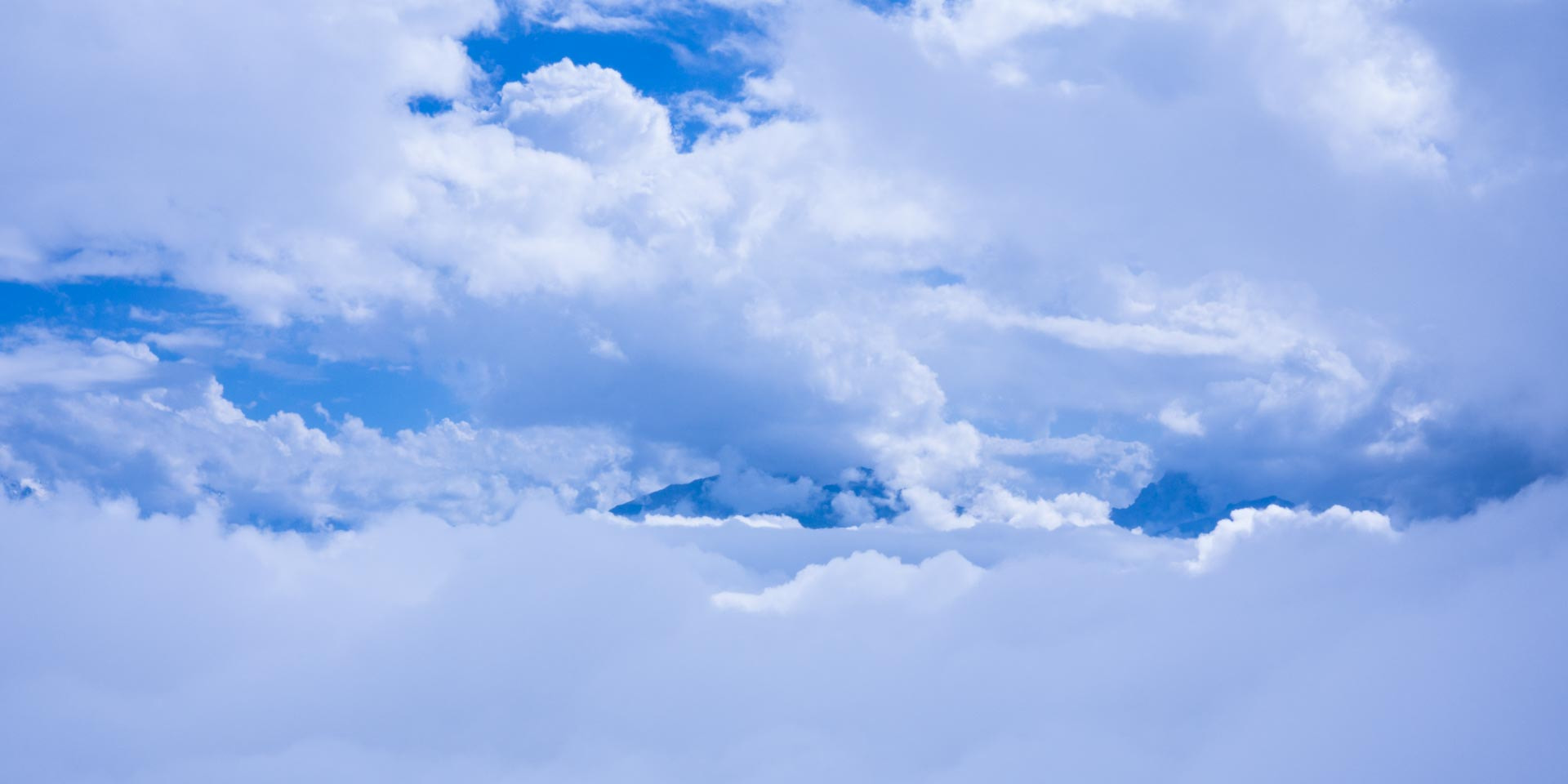 Panasonic Lumix DMC-GH3 + Panasonic Lumix G 20mm F1.7 ASPH sample photo. Caucasus clouds photography