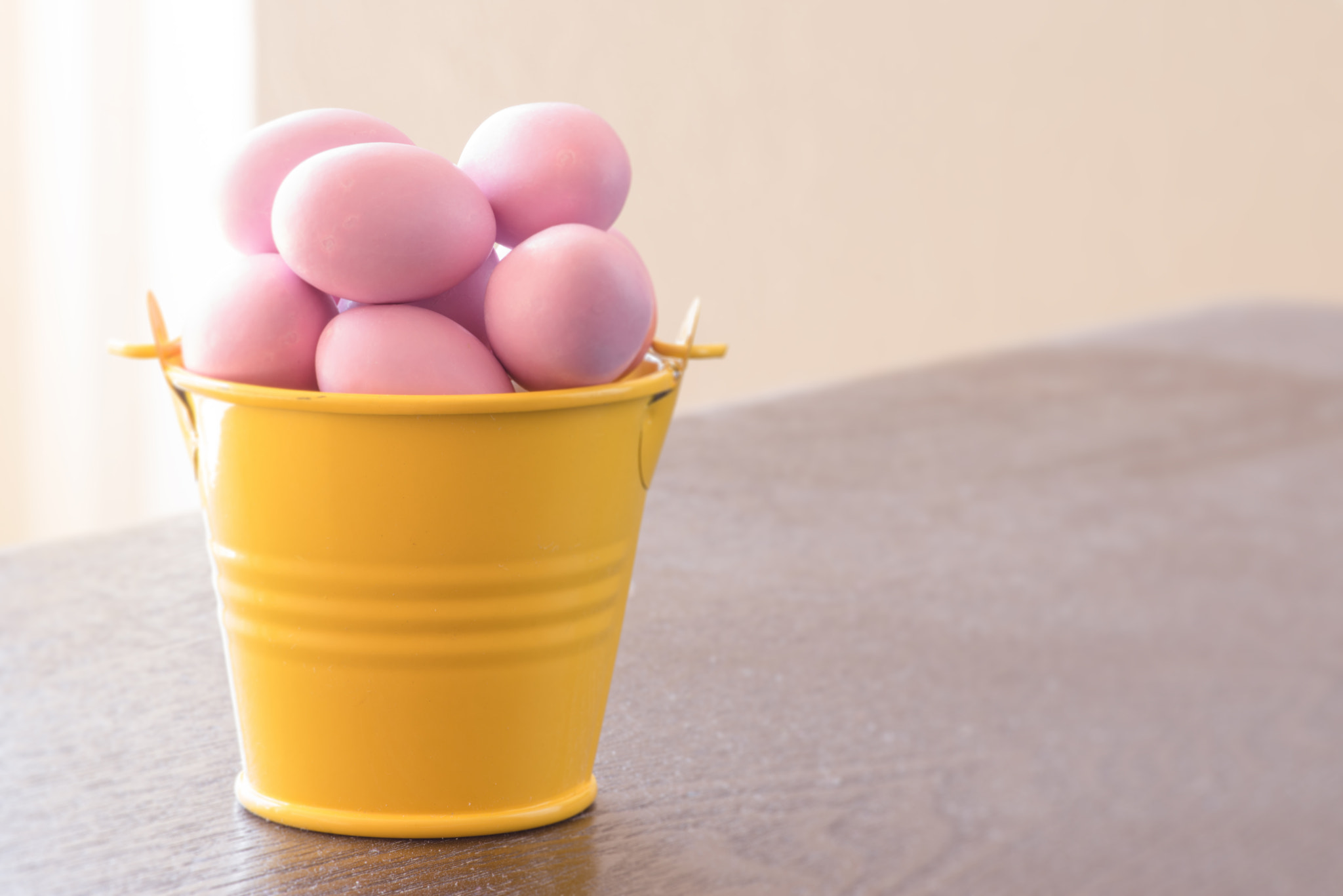 Sony a7R + Minolta AF 100mm F2.8 Macro [New] sample photo. Yellow bucket with violet easter eggs photography