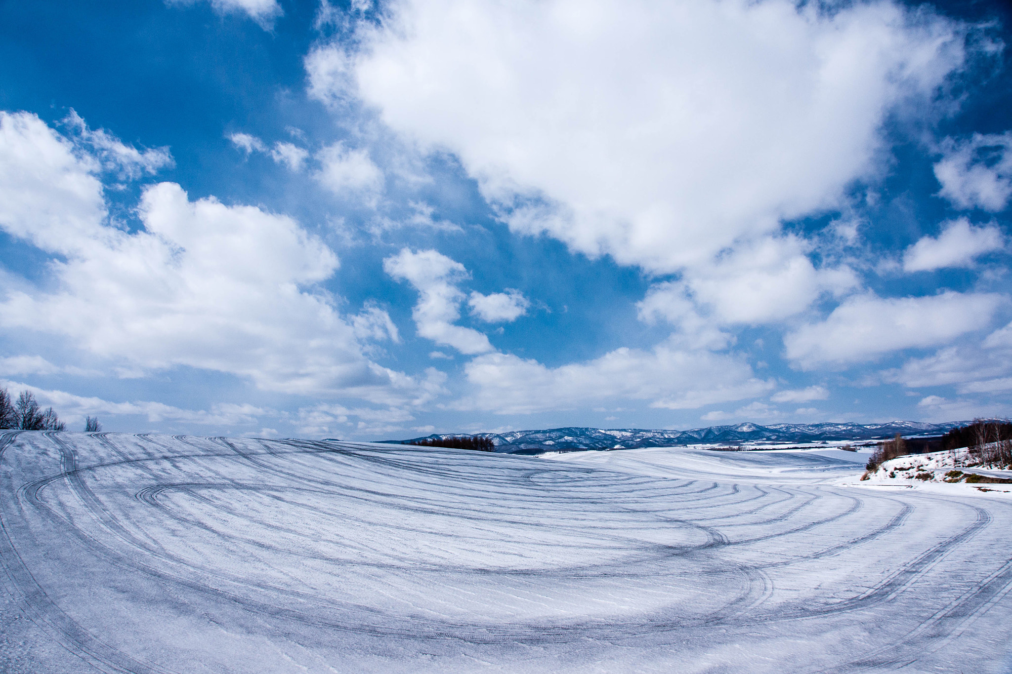 Sony Alpha DSLR-A700 sample photo. Swirling hill photography