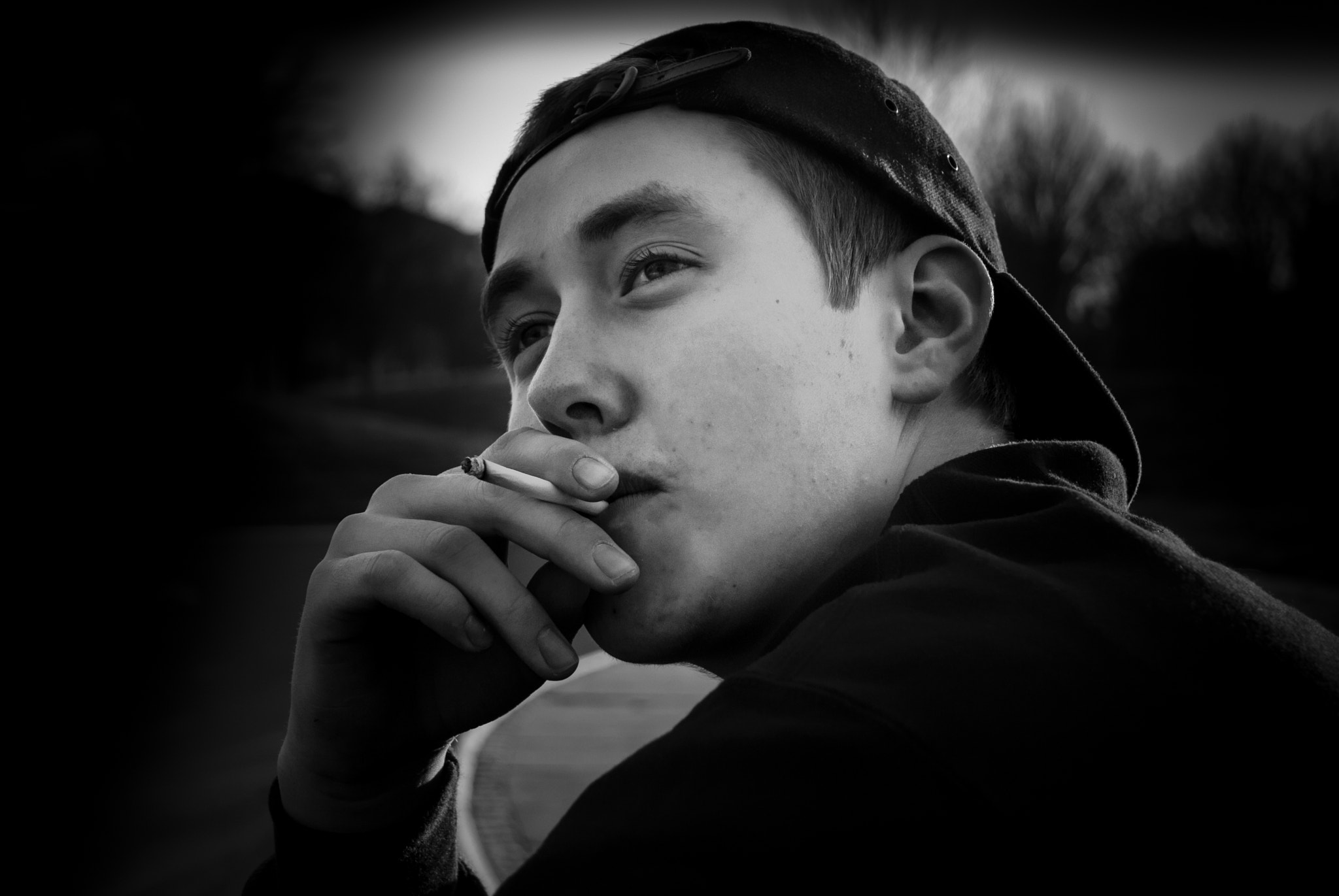Nikon D60 sample photo. Dude smoking a cigarette photography