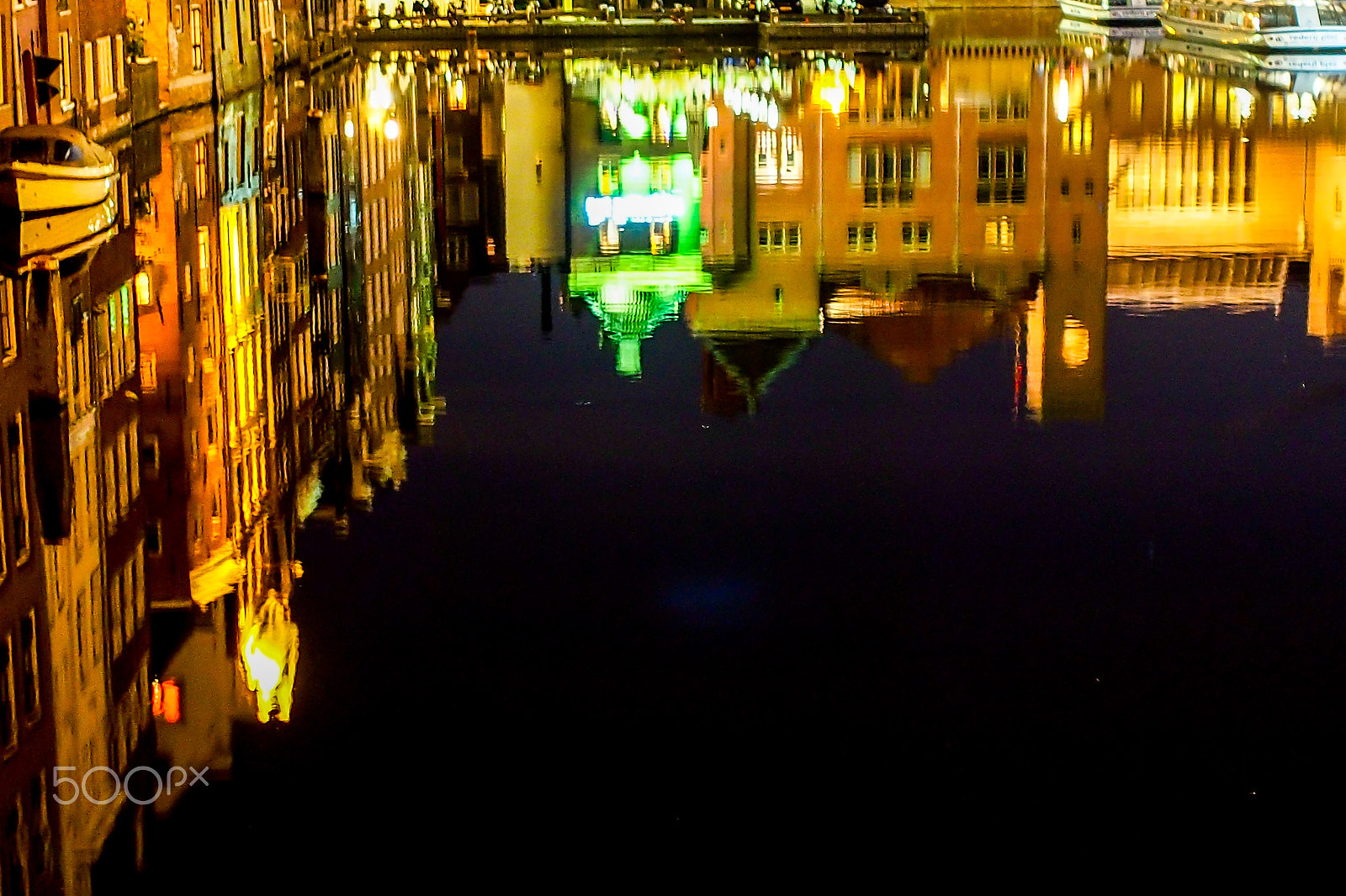 Olympus OM-D E-M5 + Olympus M.Zuiko Digital 17mm F1.8 sample photo. Amsterdam night reflections photography
