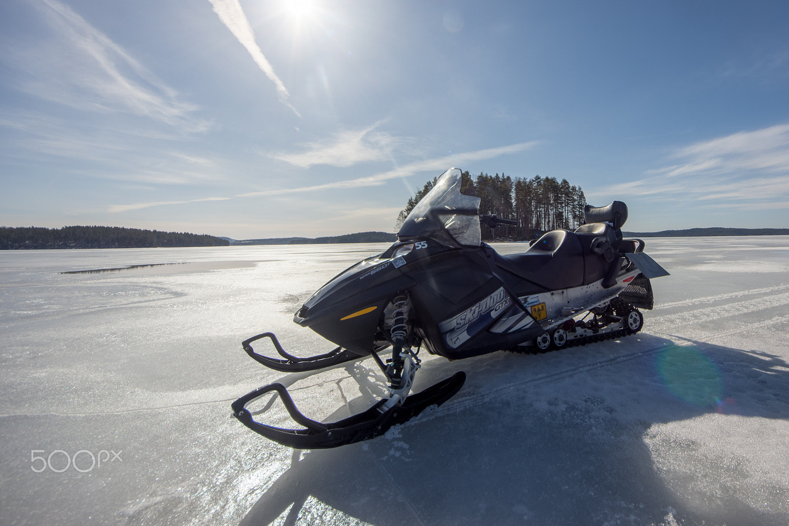 Canon EOS 600D (Rebel EOS T3i / EOS Kiss X5) + Sigma 8-16mm F4.5-5.6 DC HSM sample photo. Snowmobile on ice photography