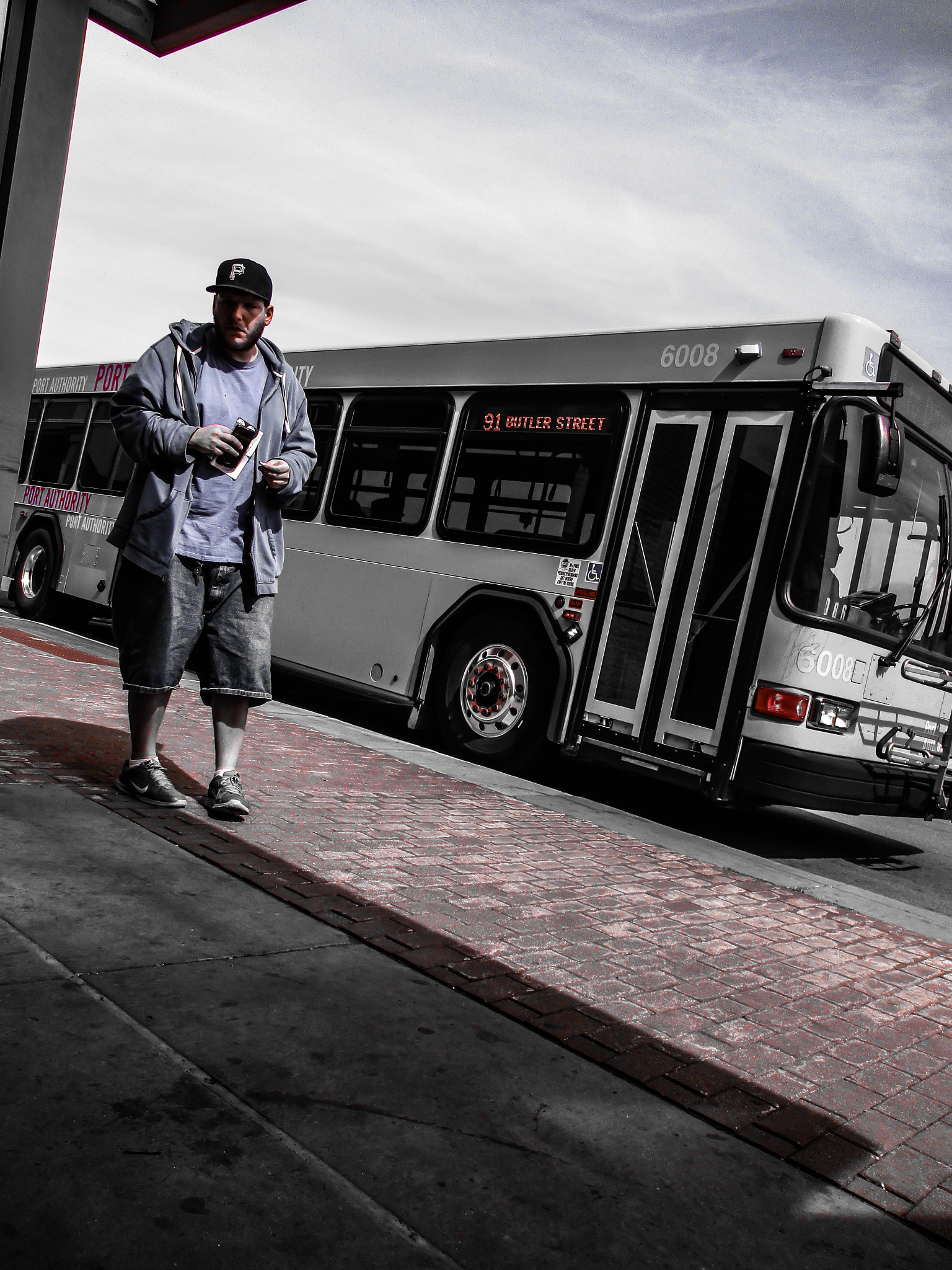 Canon PowerShot ELPH 160 (IXUS 160 / IXY 150) sample photo. A man and a bus photography