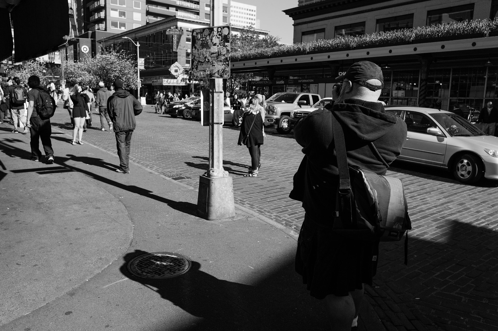 Leica M9 + Leica Elmarit-M 28mm f/2.8 (IV) sample photo. A camera man pike place seattle, wa photography