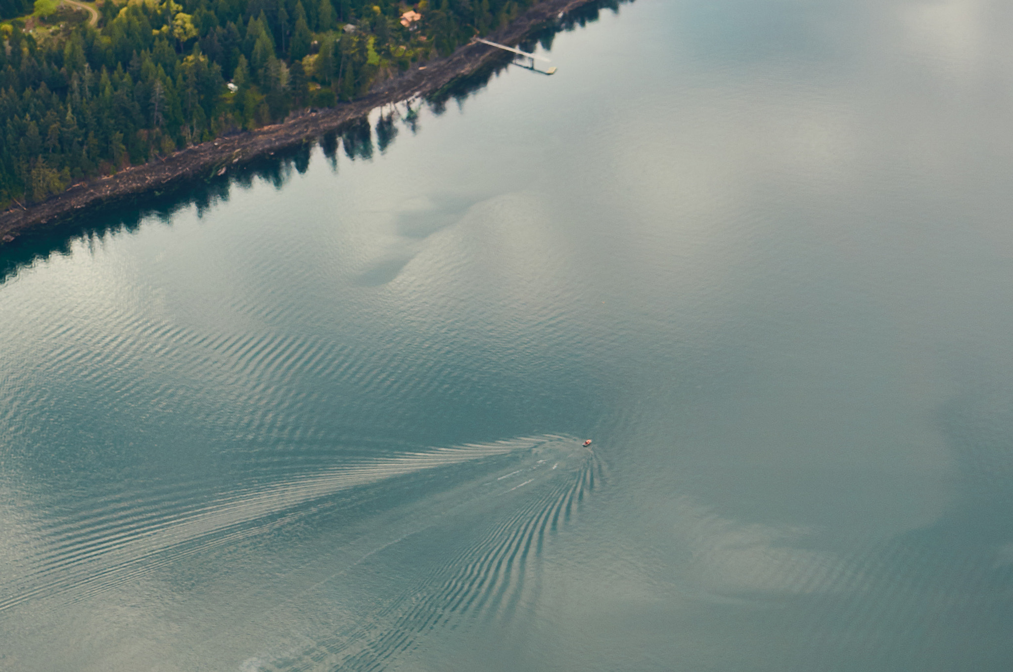 28-70mm F3.5-5.6 OSS sample photo. Boat on still water photography