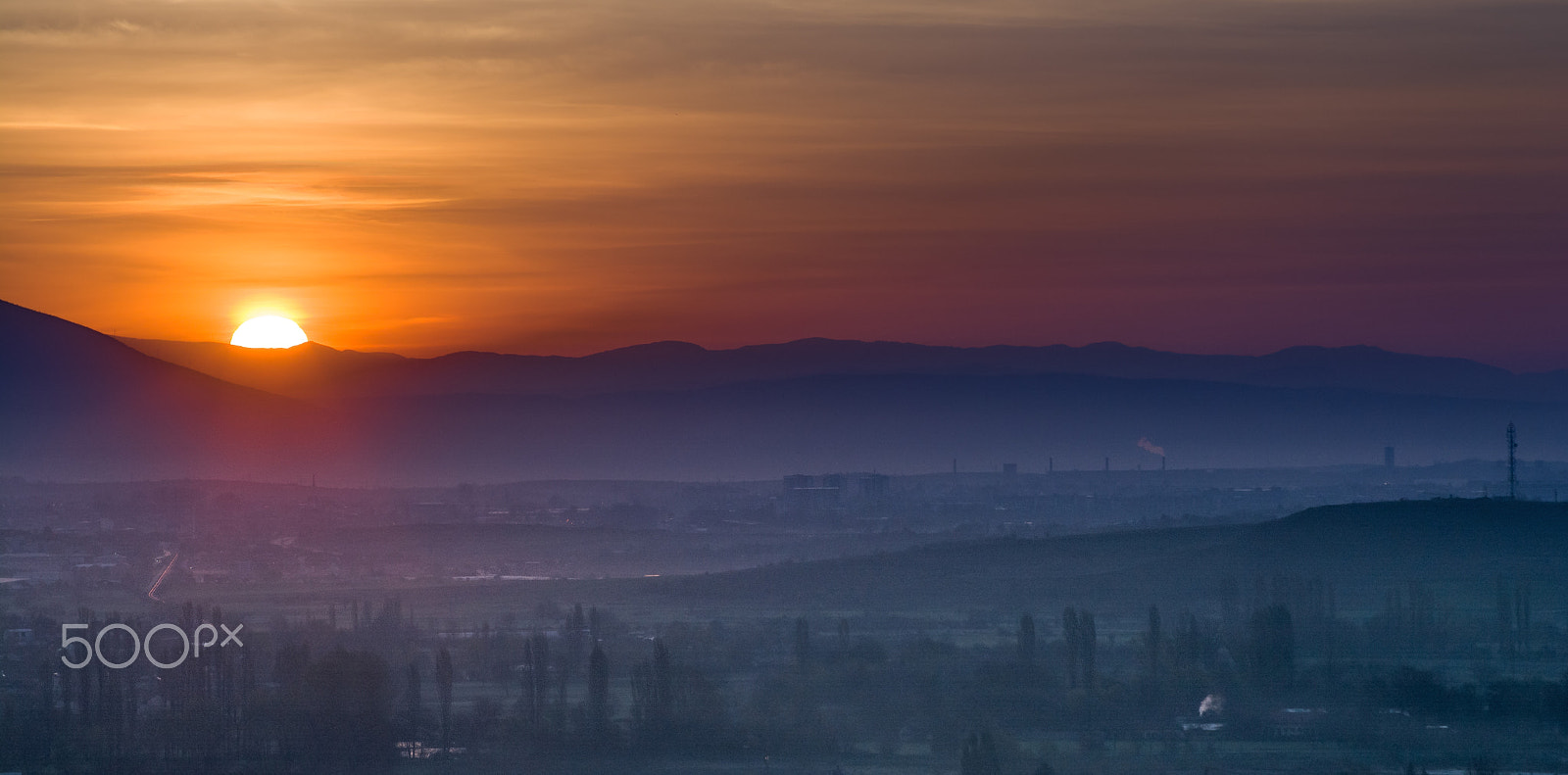 Nikon D5200 + Sigma 55-200mm F4-5.6 DC HSM sample photo. Sunrise polution photography