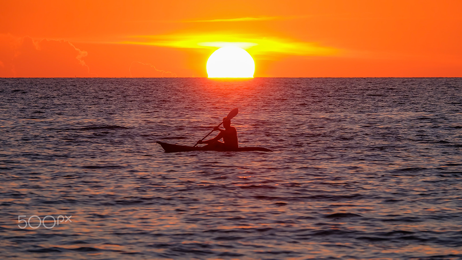 Fujifilm X-A2 + Fujifilm XC 50-230mm F4.5-6.7 OIS II sample photo. Silhouette of canoe photography