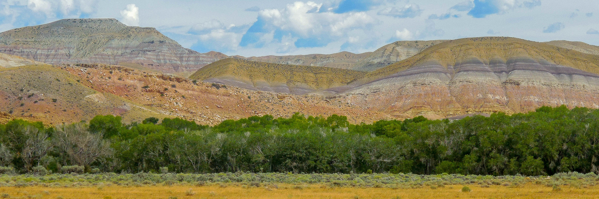 Nikon Coolpix S5200 sample photo. Multi-colored hills panorama photography