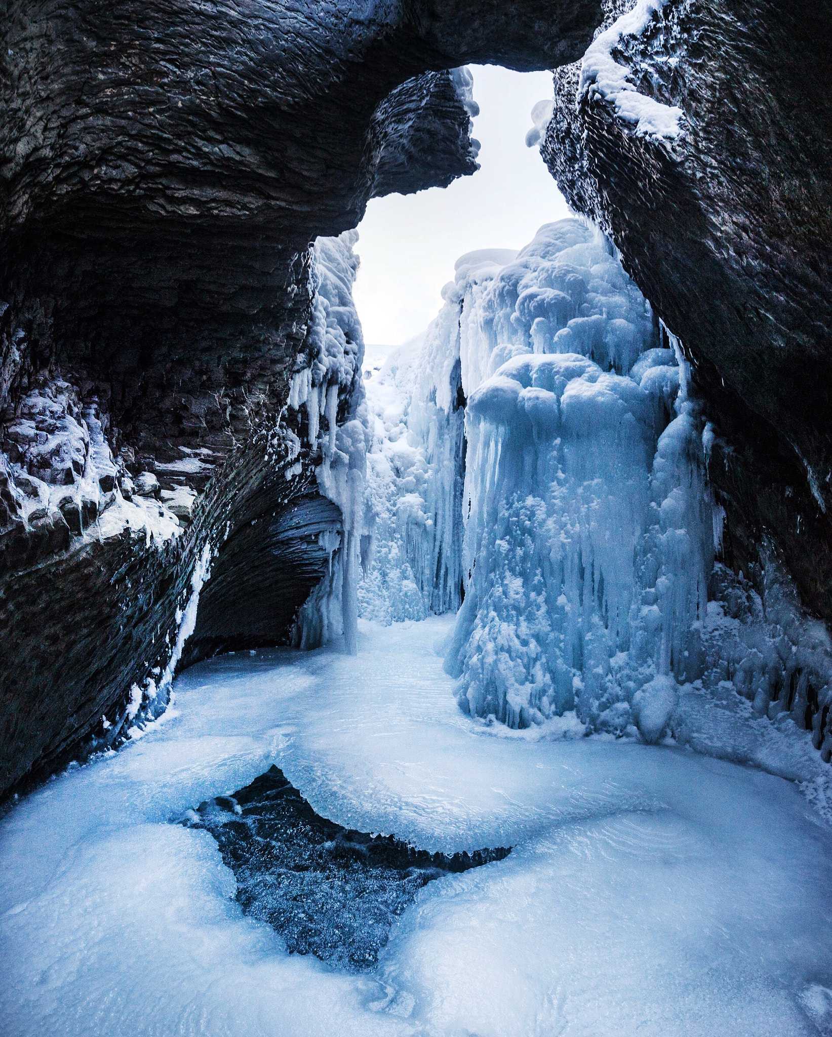 Nikon D4 + Nikon AF-S Nikkor 20mm F1.8G ED sample photo. Frozen natural bridge. yoho national park. bc. photography