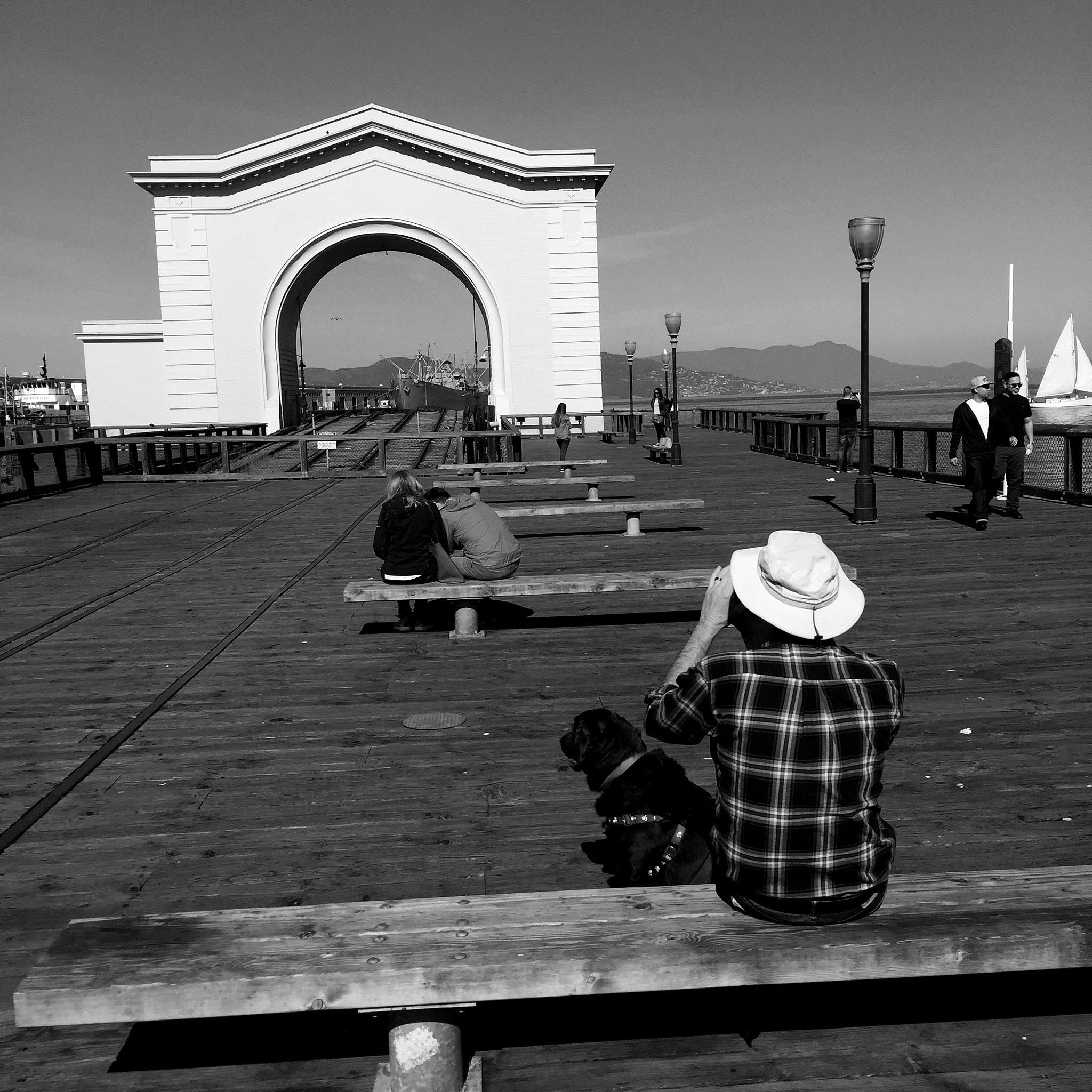 Jag.gr 6X6 for iPhone sample photo. Man with dog. couple. san francisco photography