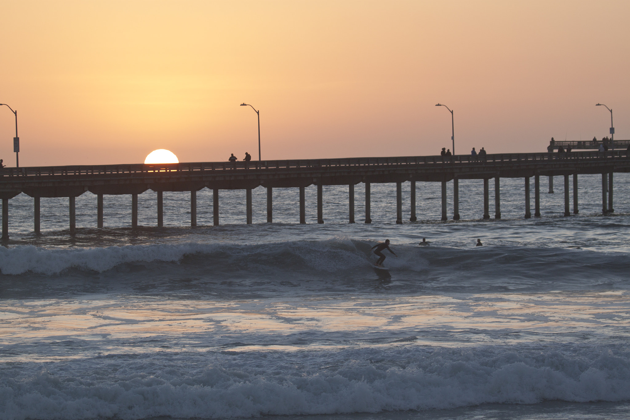 Canon EF 100-400mm F4.5-5.6L IS USM sample photo. Surfing at sunset photography