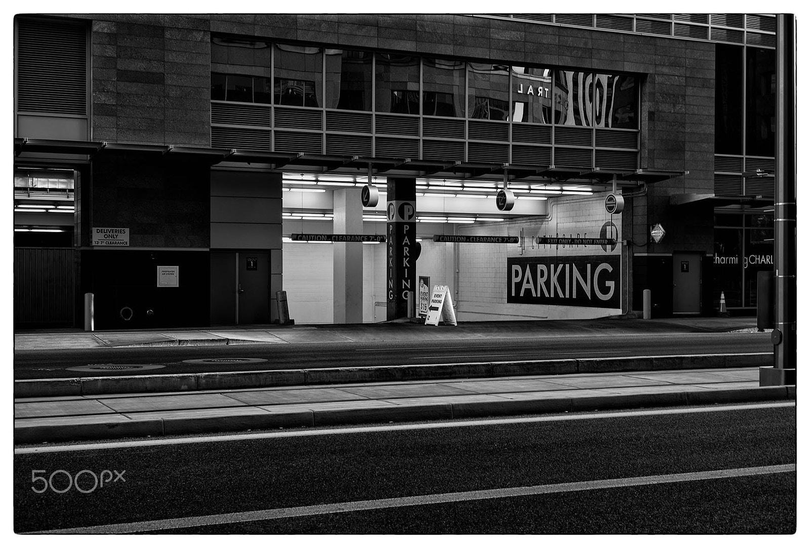 Leica Summarit-M 50mm F2.4 sample photo. Off-street parking, and a street photography