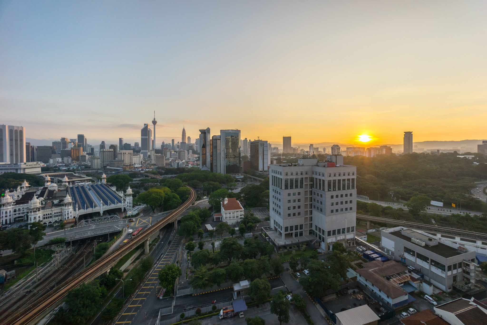 Sony a7R + Sony E 10-18mm F4 OSS sample photo. Beautiful sunrise at kuala lumpur city centre photography