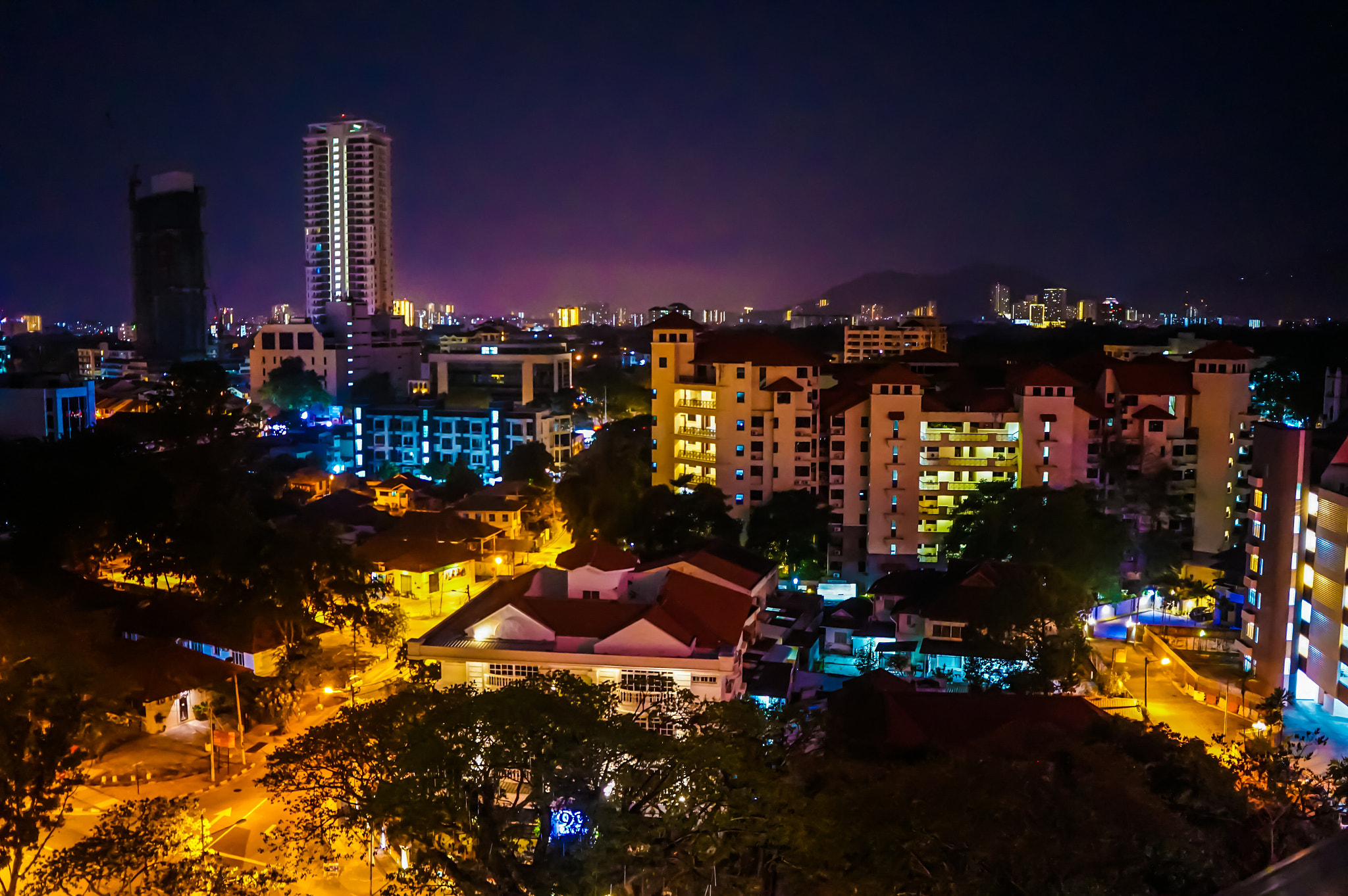 Sony Alpha QX1 + Sony E 20mm F2.8 sample photo. Colorful of city light  photography