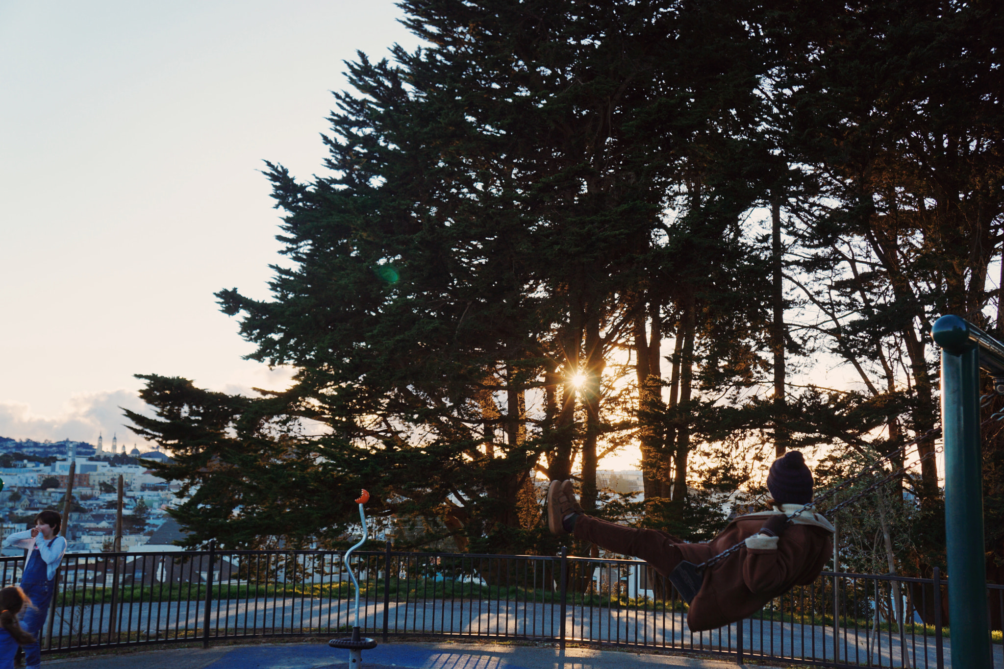 Tamron 18-200mm F3.5-6.3 Di III VC sample photo. Sunset swing photography
