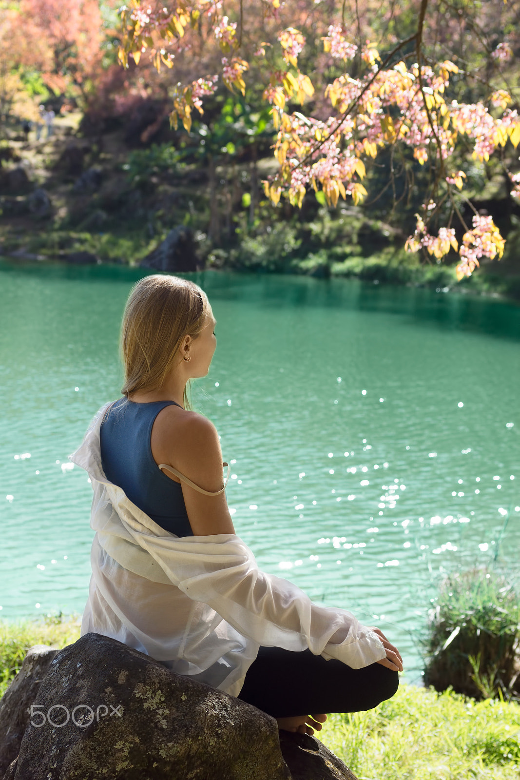 Sony SLT-A77 + MACRO 50mm F2.8 sample photo. Young woman meditating by the water photography