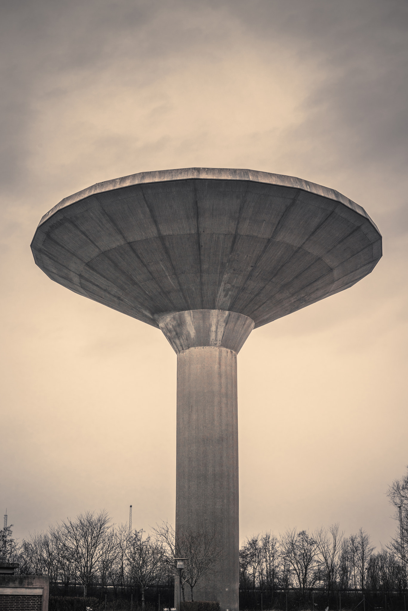 Sony a7R + Sony 50mm F1.4 sample photo. Water tower in cloudy weather photography