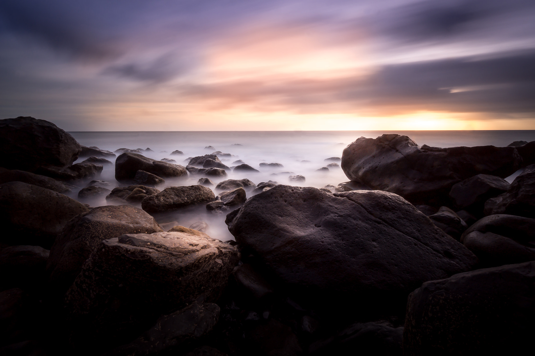 Sony Alpha NEX-6 + Sony E 10-18mm F4 OSS sample photo. Sunset on soft water photography