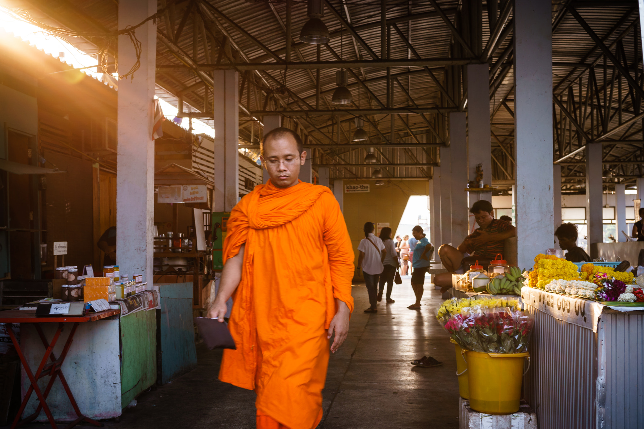 E 32mm F1.8 sample photo. Monk on his way photography