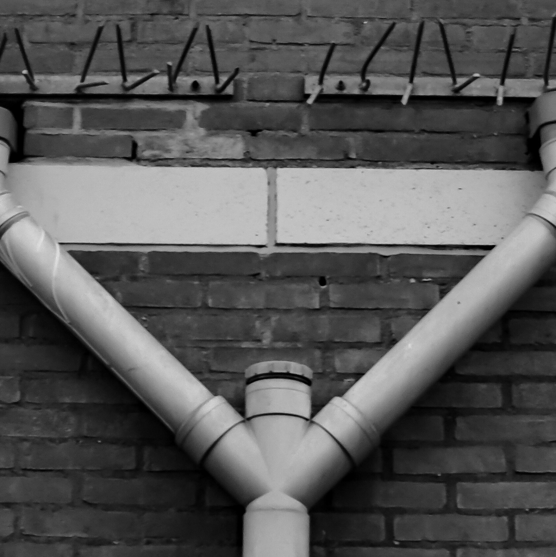 Olympus PEN E-PM2 sample photo. Symmetrical pipe photography