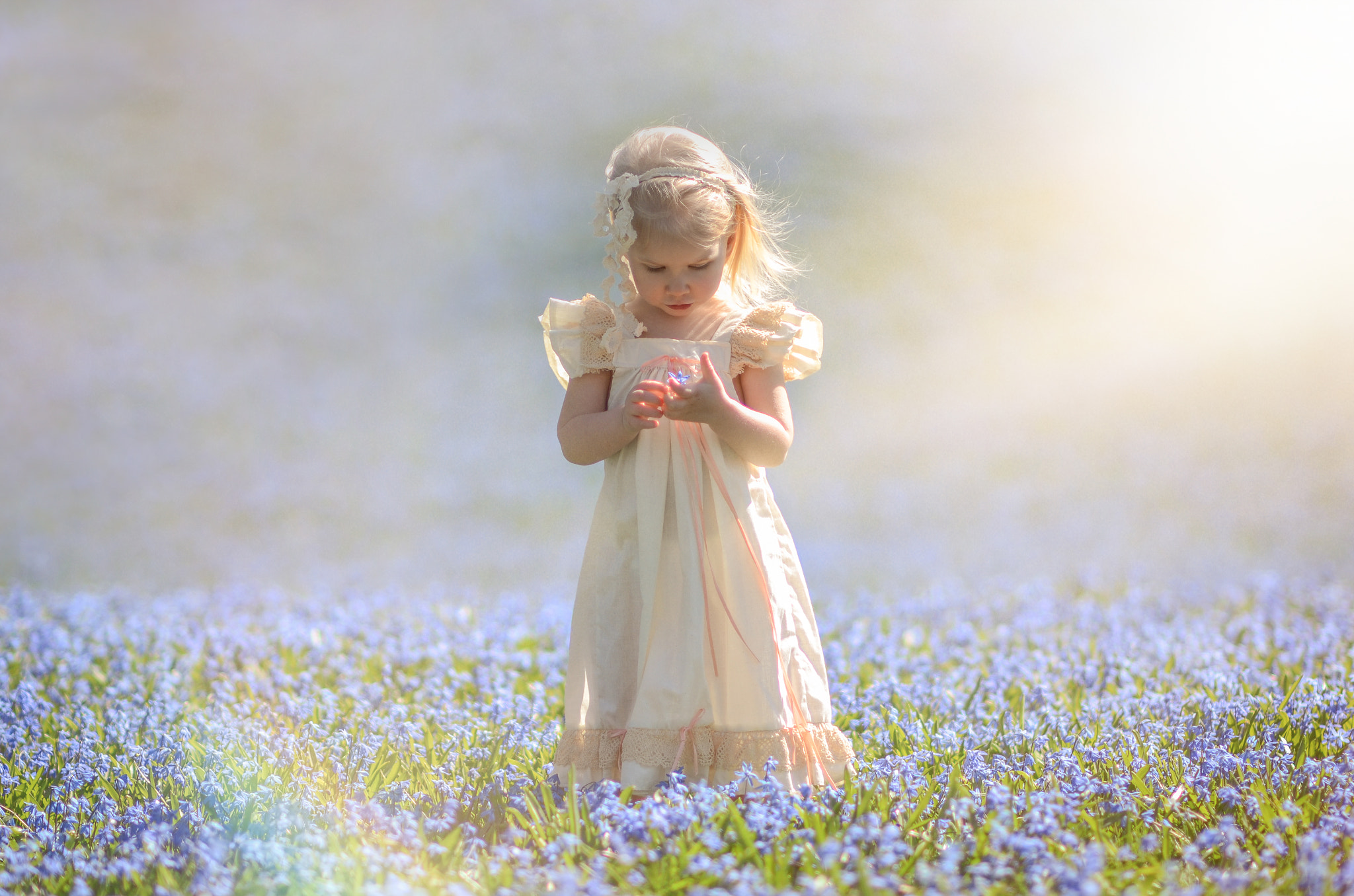 Nikon D7000 + Nikon AF-S Nikkor 85mm F1.4G sample photo. Picture of my daughter at the smeltzer house in iowa. the entire yard is a sea of these flowers. photography