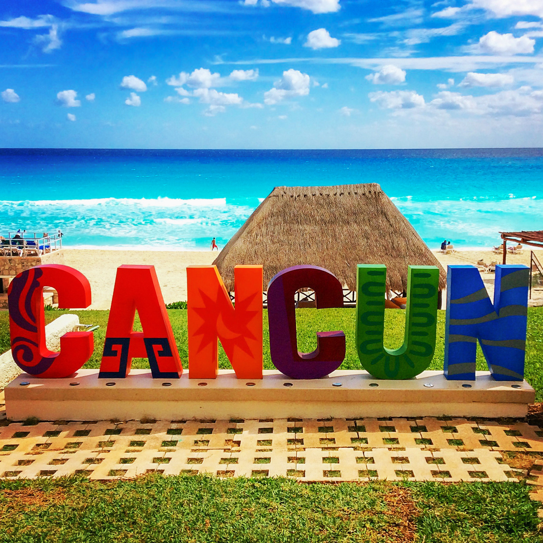 iPad Air back camera 3.3mm f/2.4 sample photo. Cancun sign photography