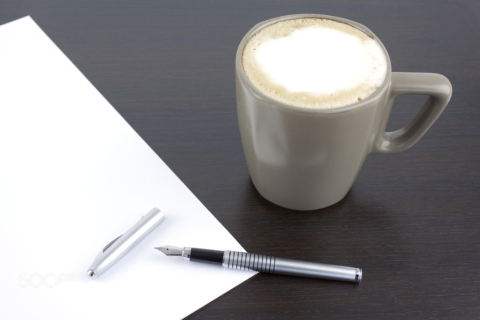 Canon EF-S 18-55mm F3.5-5.6 III sample photo. Cup of coffee and a pen on office table photography