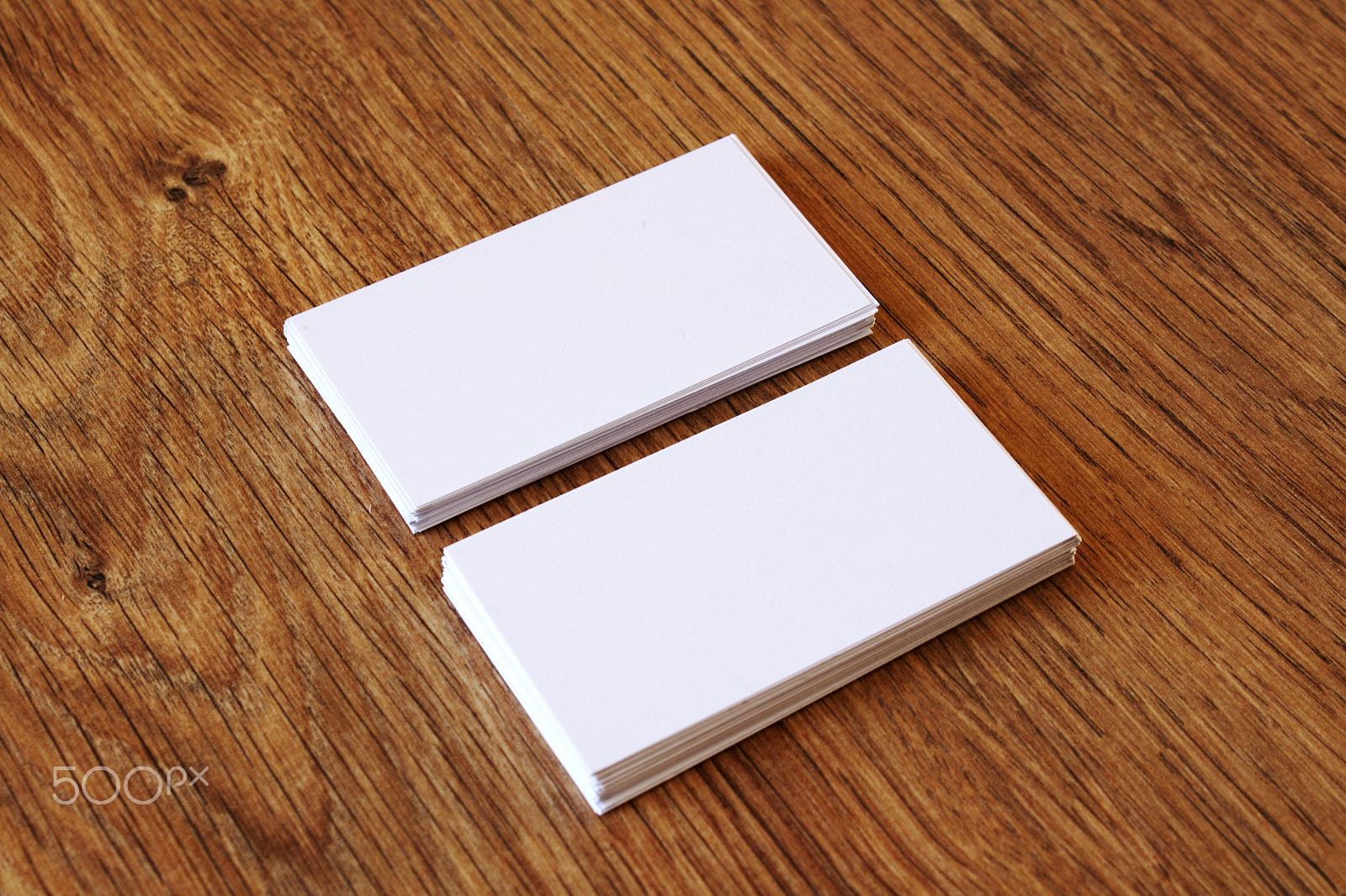 Canon EF-S 18-55mm F3.5-5.6 III sample photo. Blank business card on a office table photography
