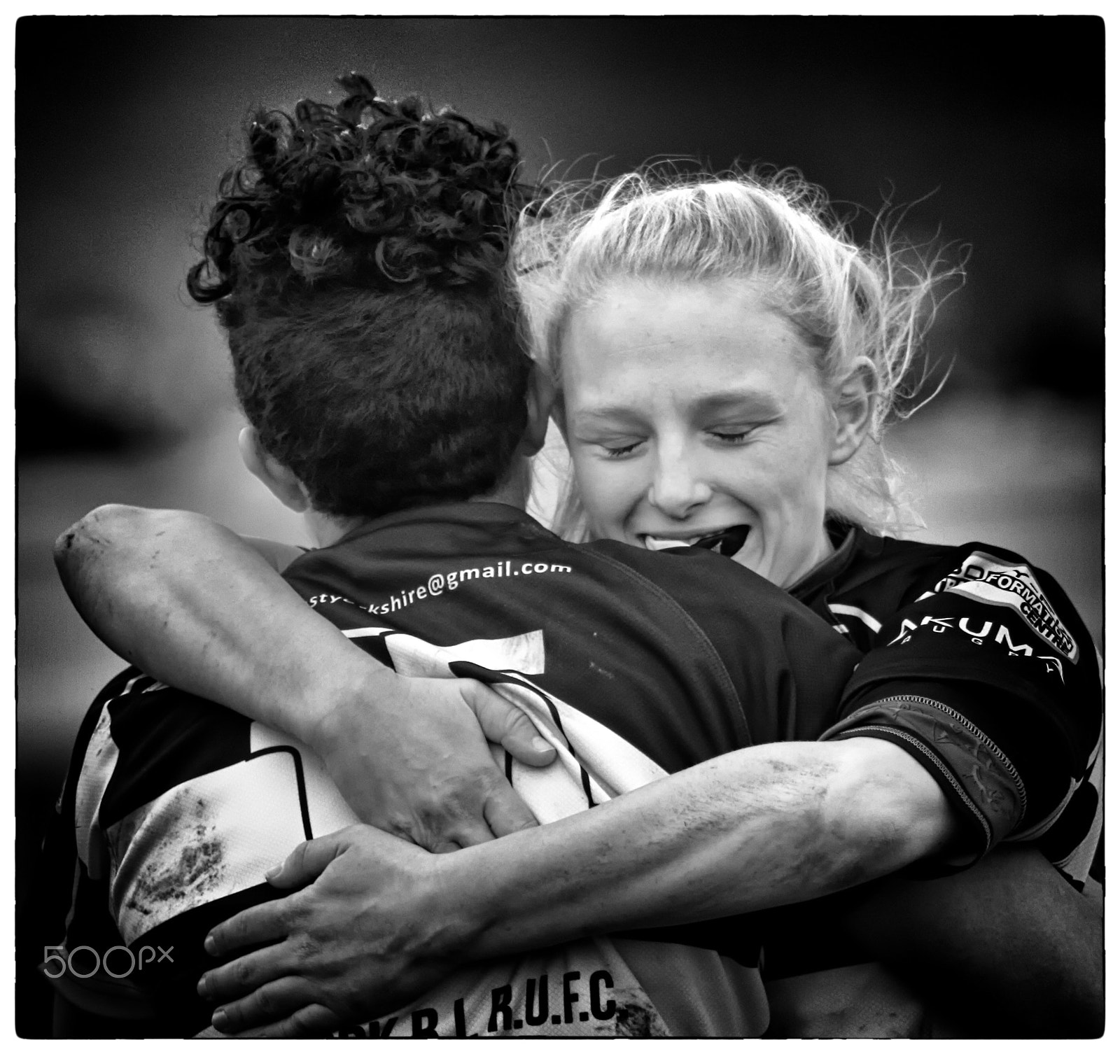 Canon EF 200mm F2.8L II USM sample photo. Rugby hug photography