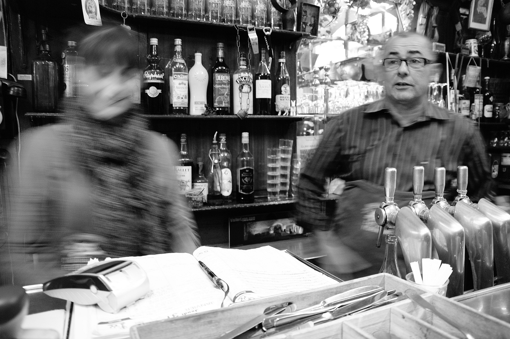 Sony Alpha DSLR-A380 sample photo. Ghost and boss at cafe des federations photography