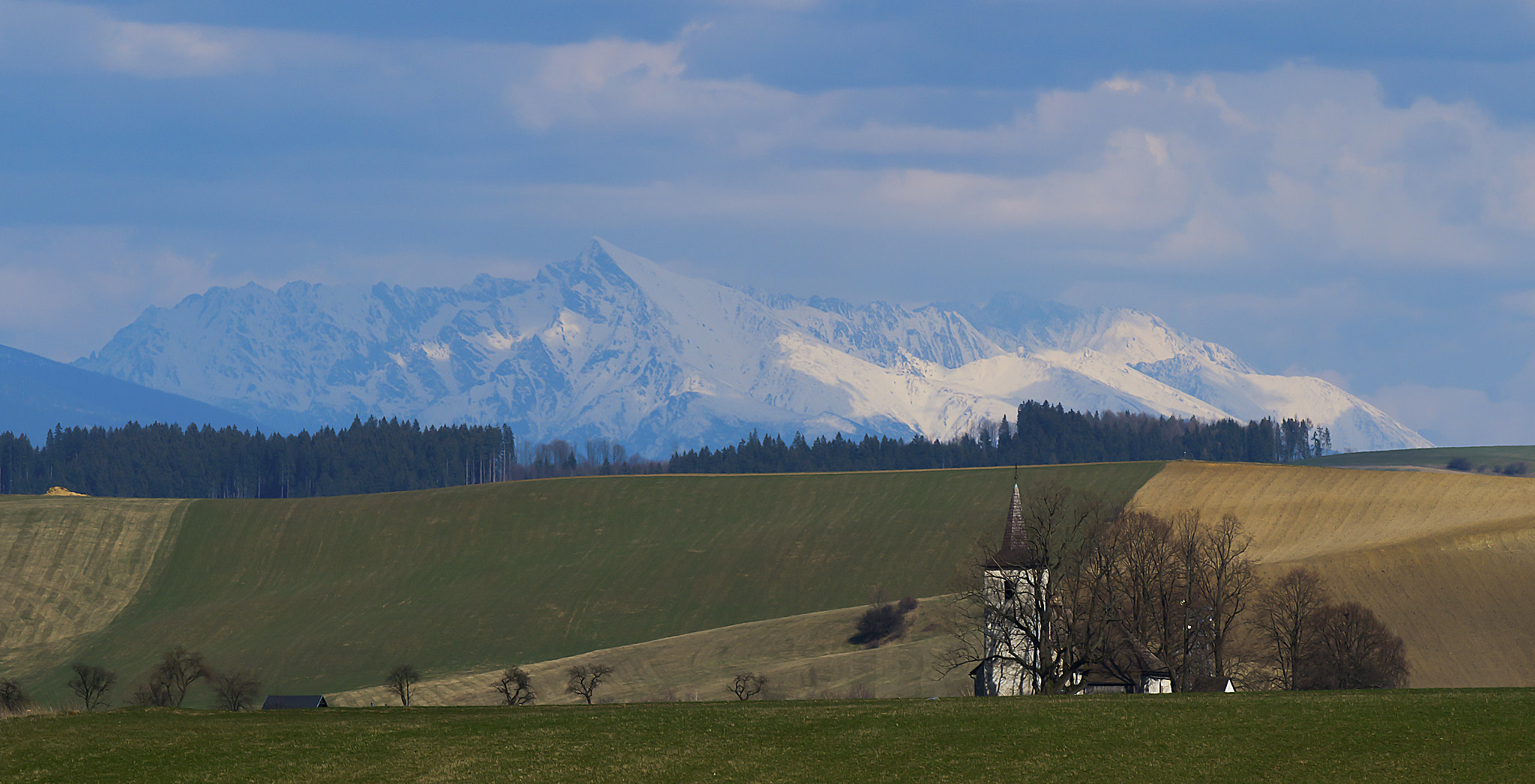 Tamron SP 70-300mm F4-5.6 Di USD sample photo. High tatras with a small church... photography