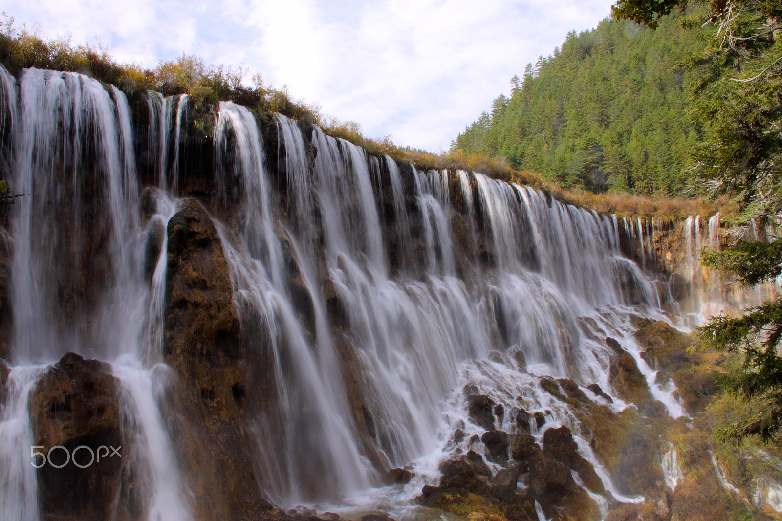 Canon EF-S 18-200mm F3.5-5.6 IS sample photo. Waterfall with rainbow photography