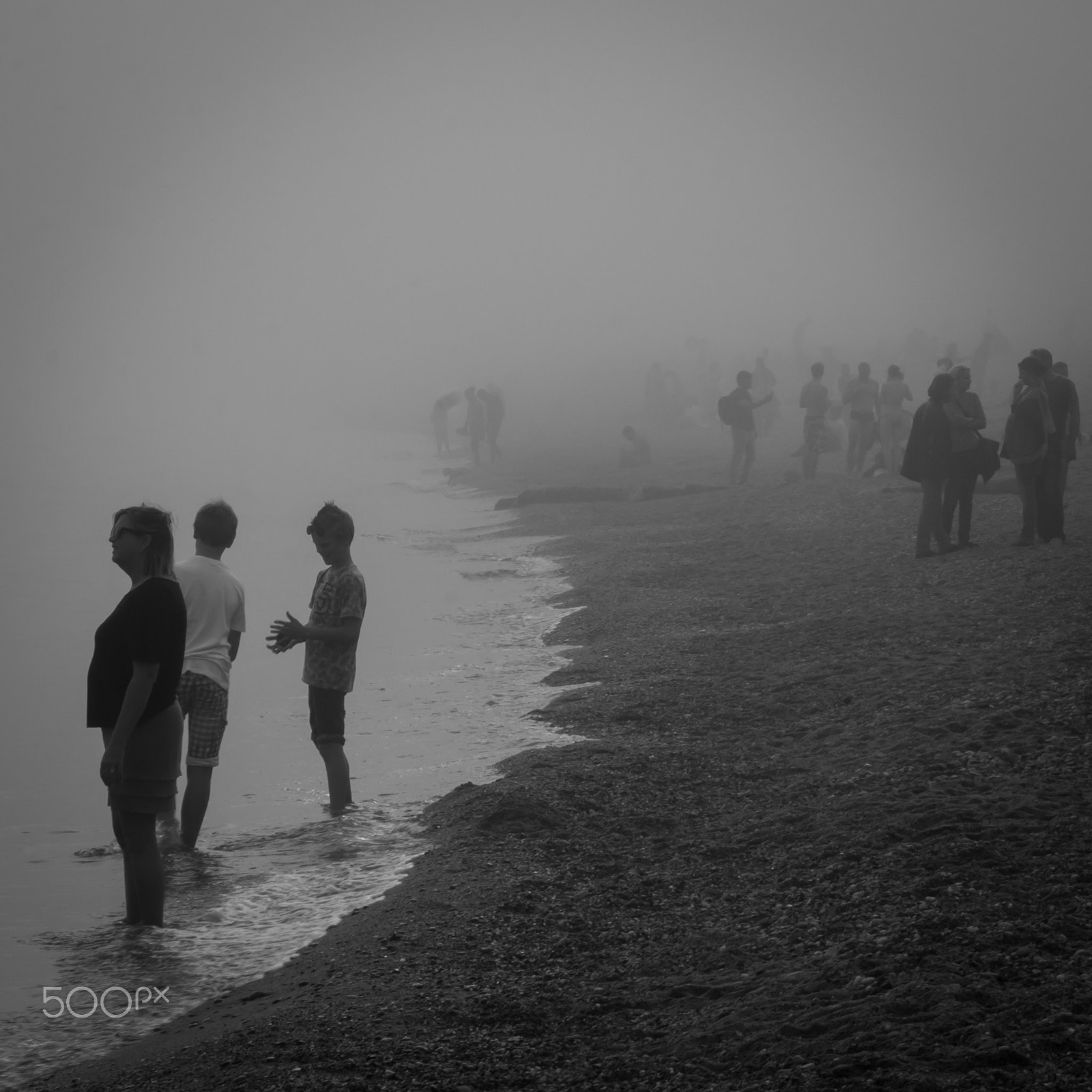 Sony E 18-200mm F3.5-6.3 OSS LE sample photo. Foggy barceloneta beach photography
