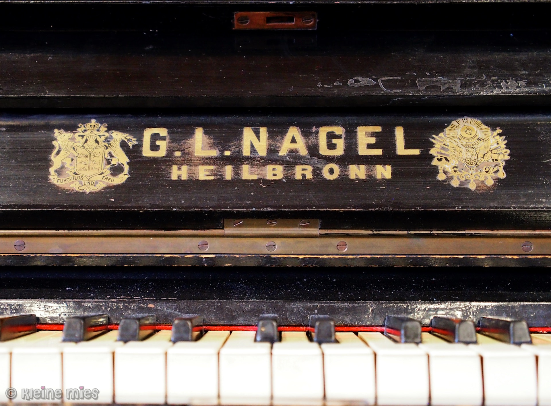 Panasonic Lumix G X Vario 12-35mm F2.8 ASPH Power OIS sample photo. Worn down piano photography