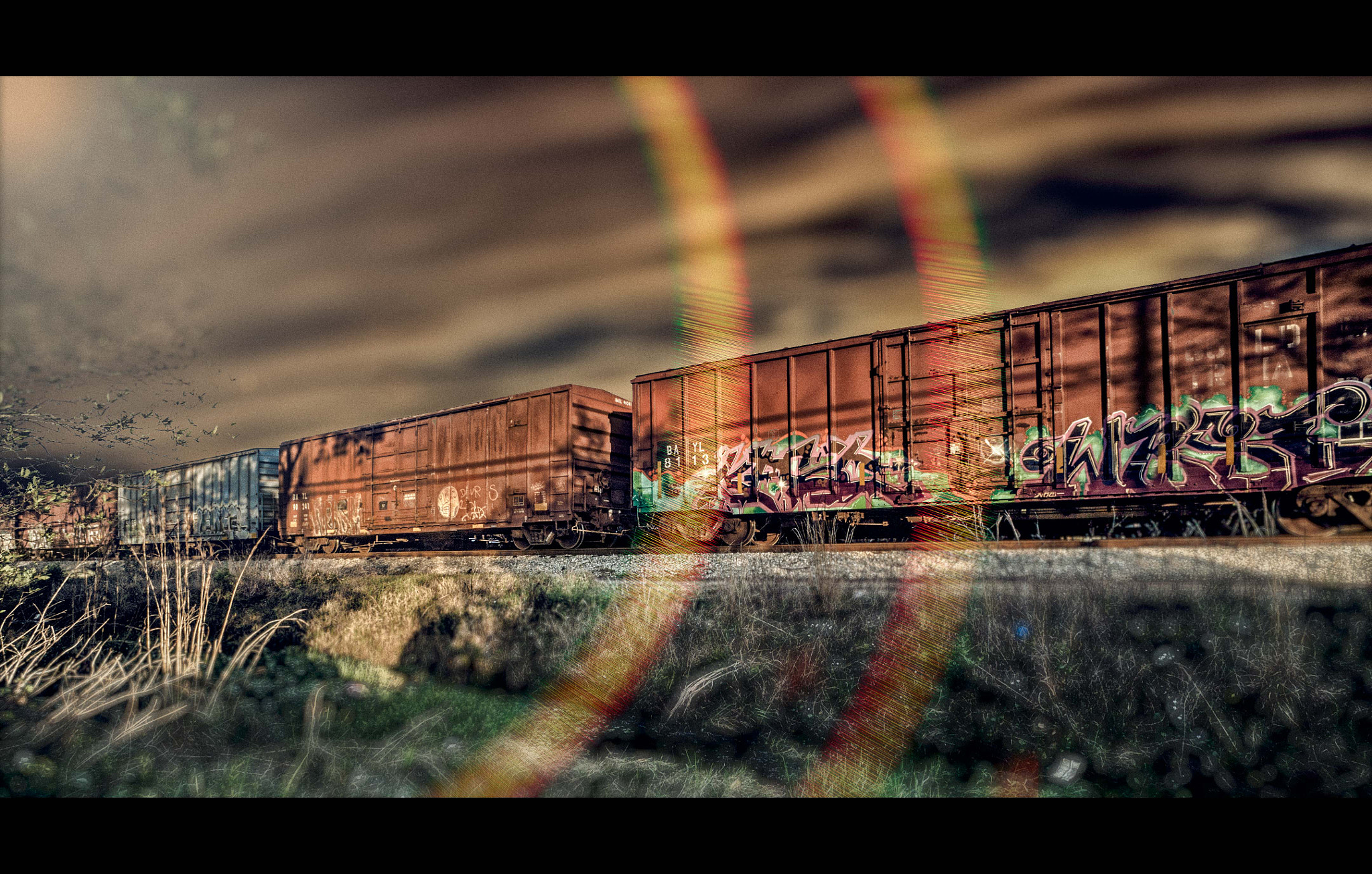 Sony Alpha NEX-3N + Sony E 16mm F2.8 sample photo. A running train photography