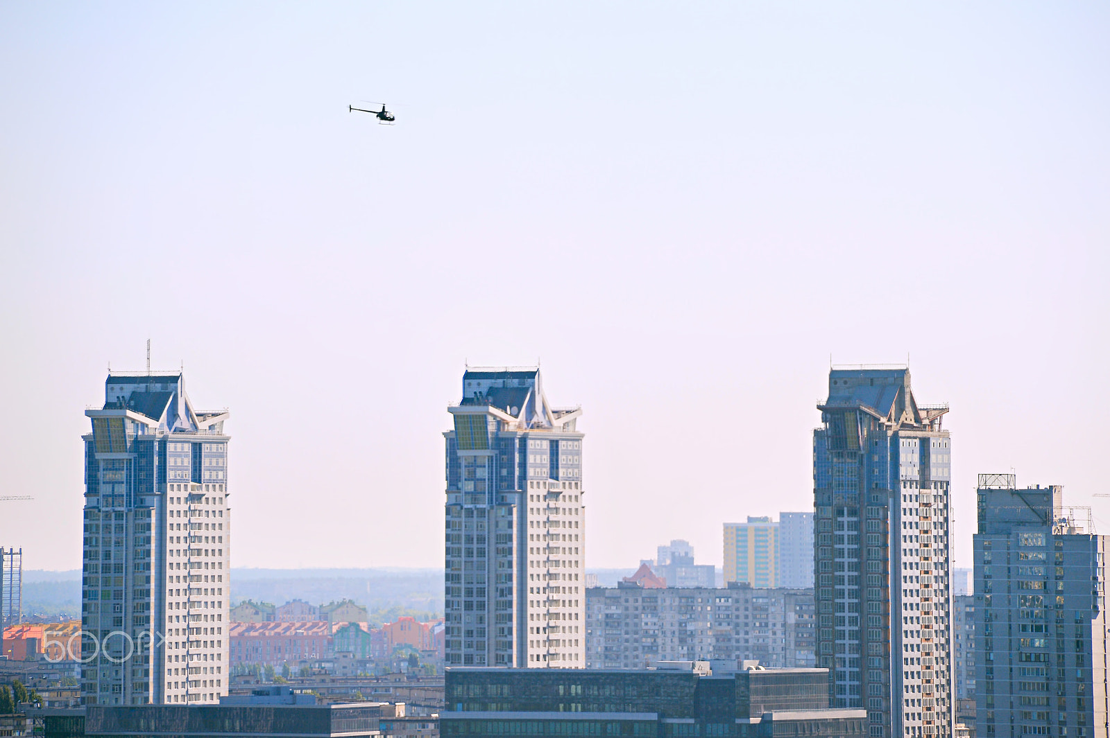 Nikon Df + Nikon AF-S Nikkor 28-300mm F3.5-5.6G ED VR sample photo. Copter over the city photography