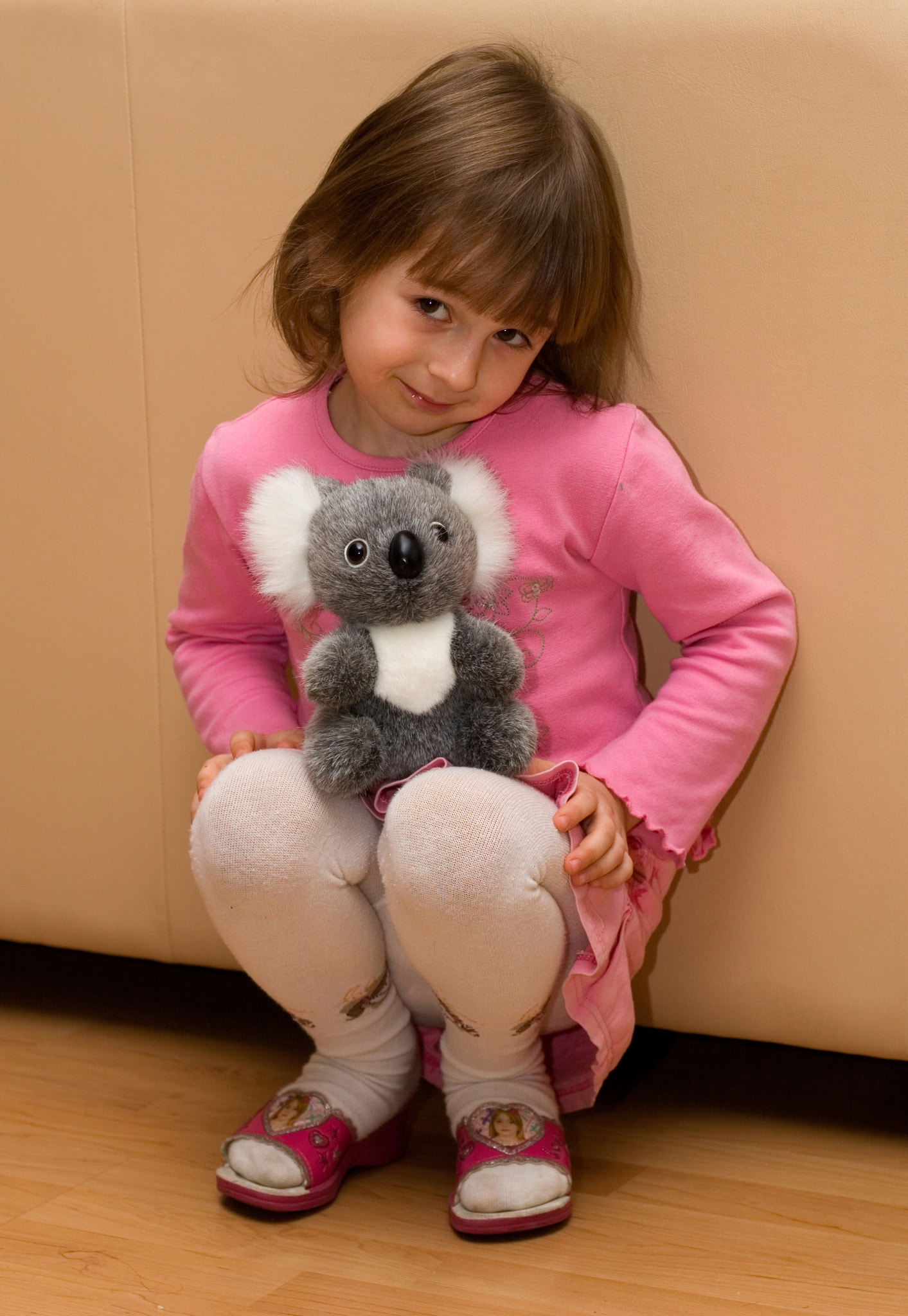 Canon EOS 30D + Canon EF 50mm F1.4 USM sample photo. Girl with toy photography