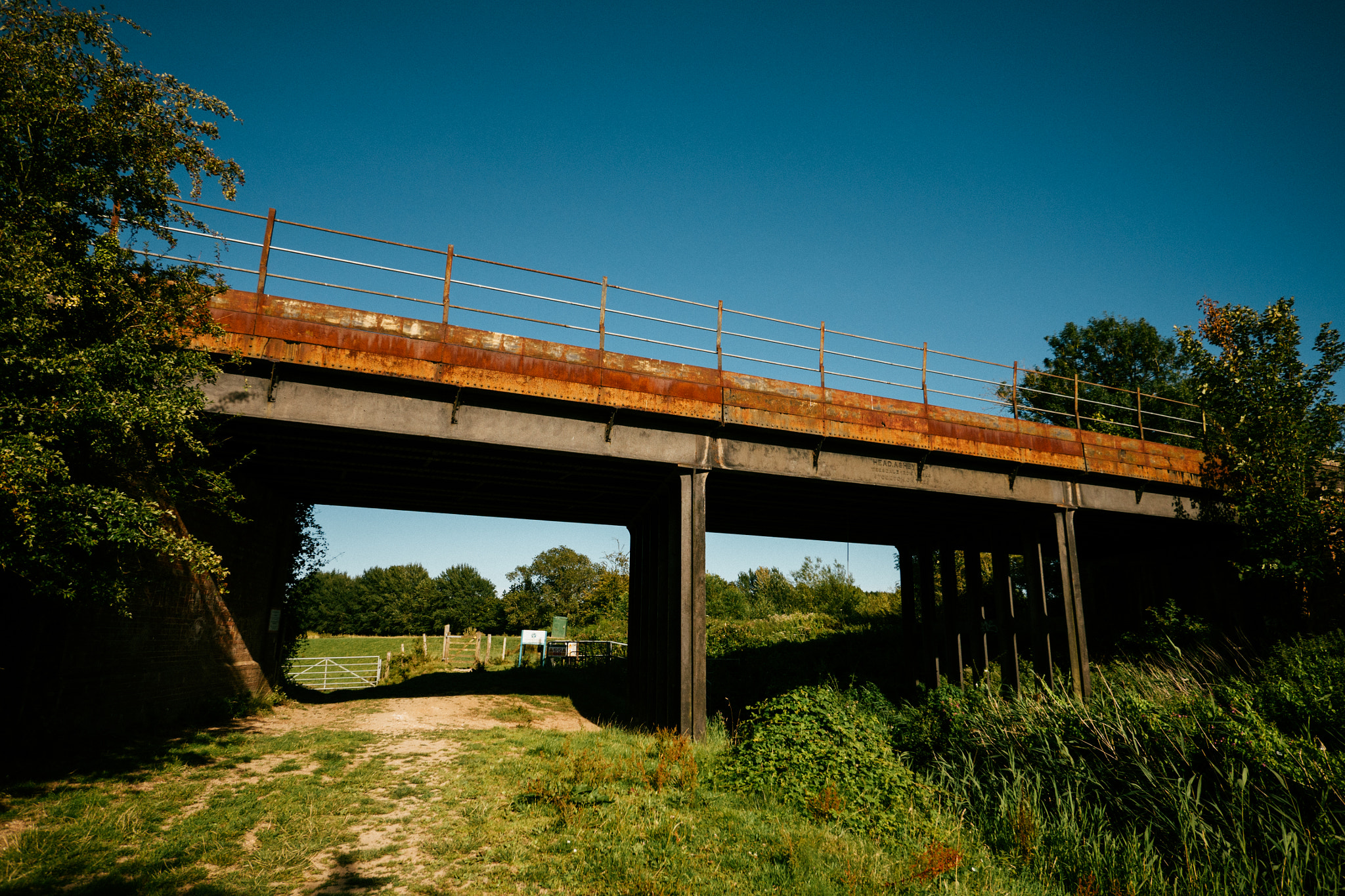 Panasonic Lumix G Vario 7-14mm F4 ASPH sample photo. Rusting railway bridge photography