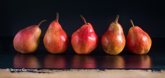 Nikon D800 + AF Nikkor 50mm f/1.8 sample photo. Red pears on black background photography