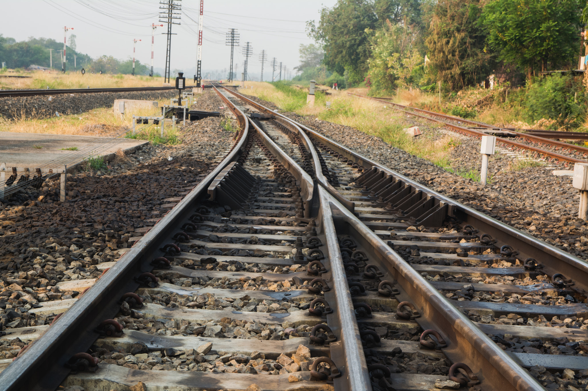 Nikon D5200 + Sigma 17-70mm F2.8-4 DC Macro OS HSM | C sample photo. Train routes converge photography