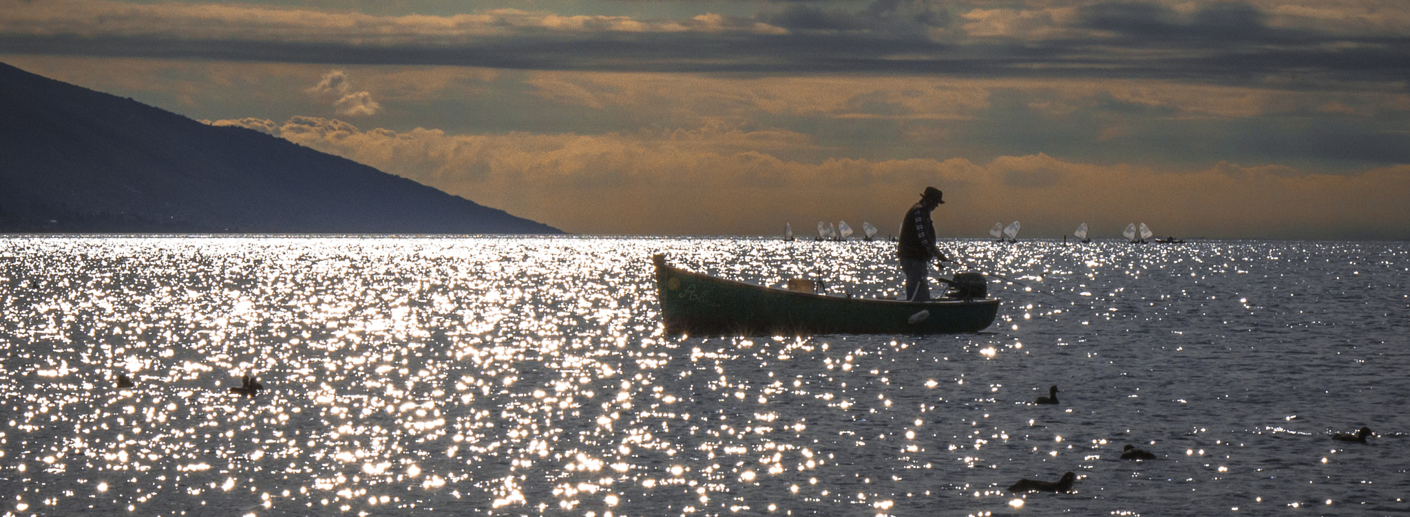 Canon EF-S 18-135mm F3.5-5.6 IS STM sample photo. Fishing at sunset photography