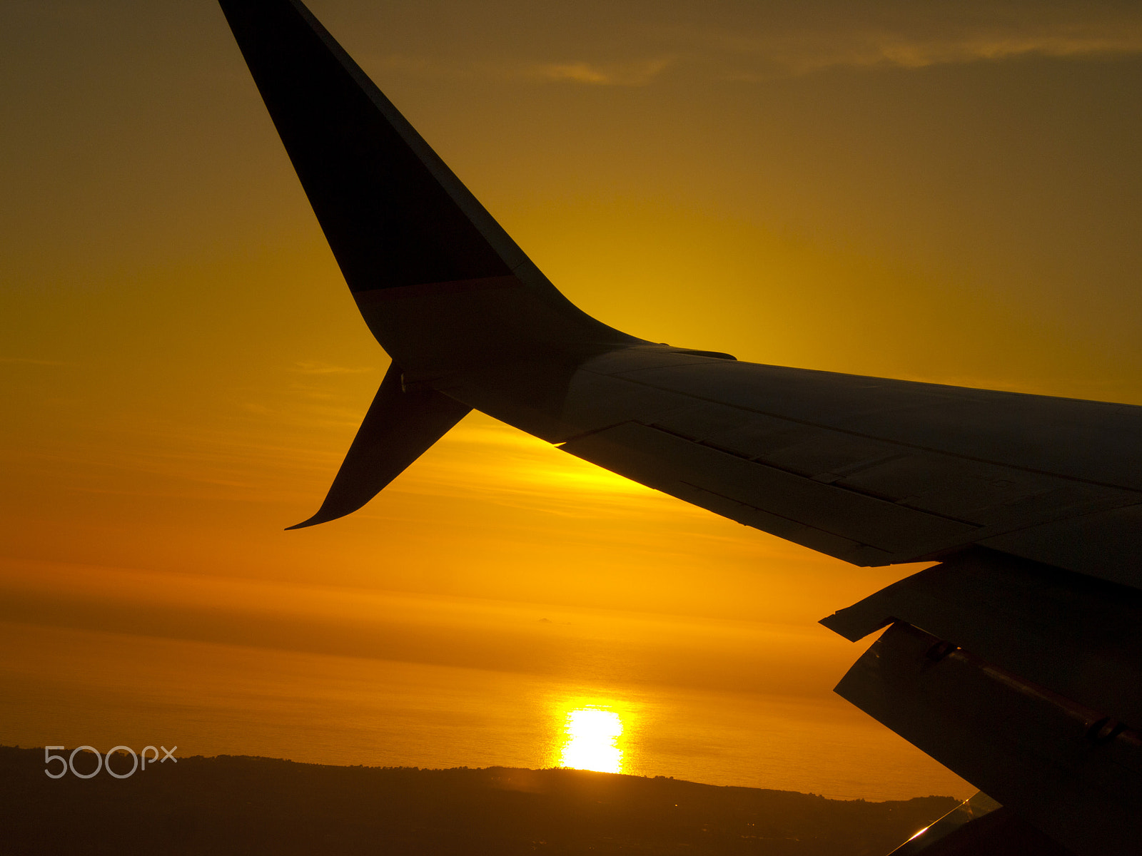Olympus PEN E-P1 sample photo. Sunset from the air photography