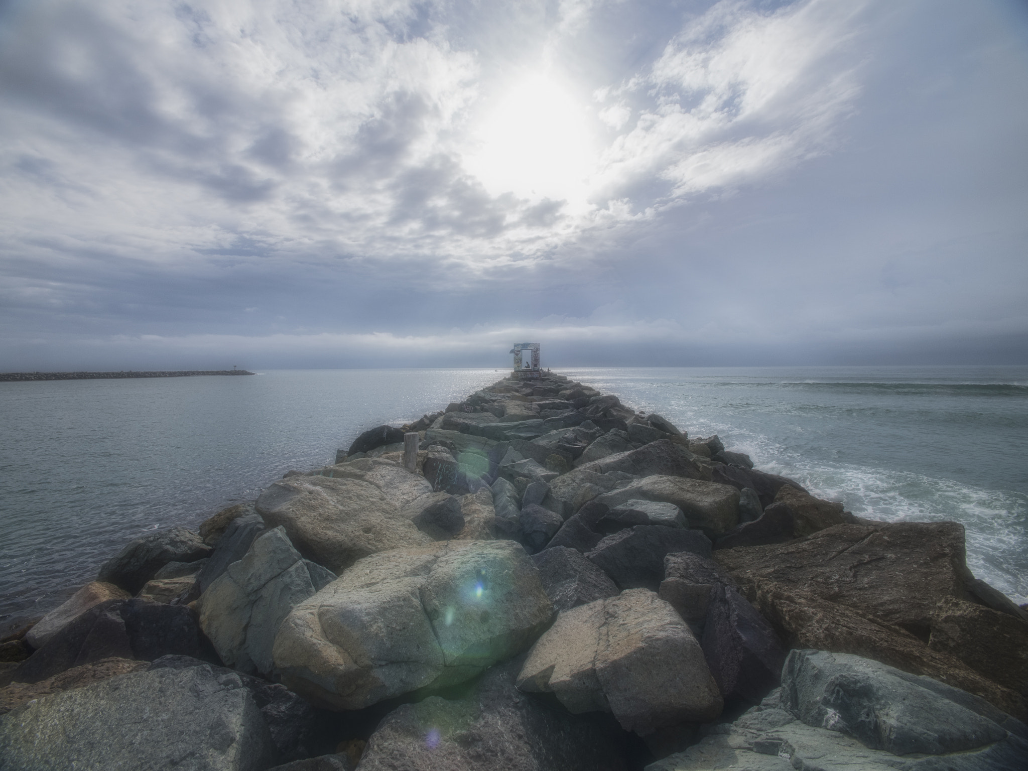 Panasonic Lumix DMC-GH4 + .64x Sigma DC 10-20/4-5.6 EX HSM sample photo. Mission beach jetty photography