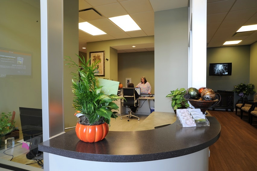 ZEISS Distagon T* 21mm F2.8 sample photo. Front desk and accounts office at beautiful dentistry photography