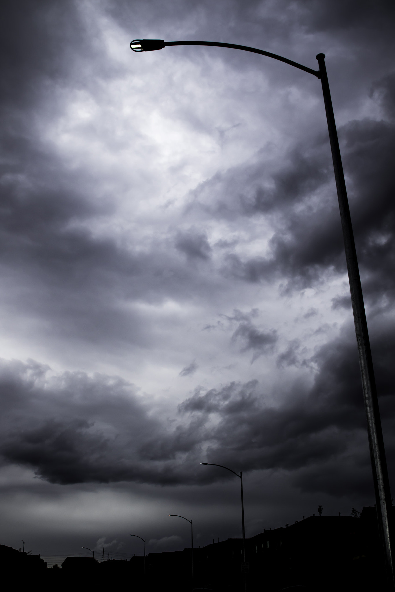 Canon EF 400mm f/2.8L sample photo. Dark skies and street lights photography