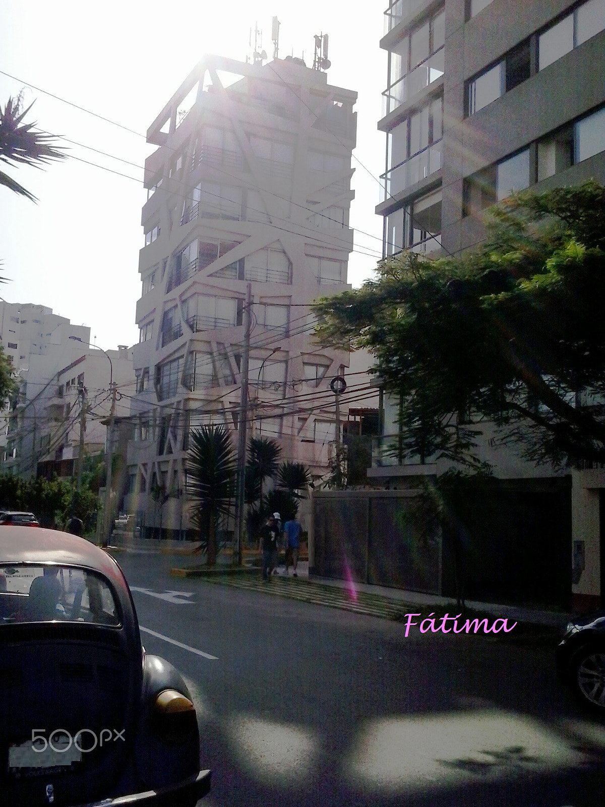 Samsung Galaxy Music Duos sample photo. Edificio en miraflores y los rayos del sol photography
